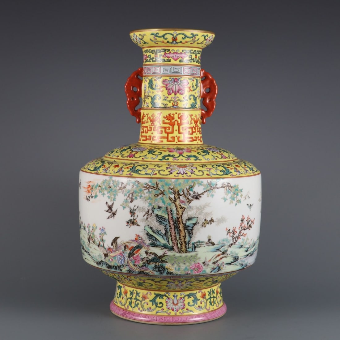 An Exquisite Yellow Ground Yangcai Flower and Bird Pattern Double-Ears Vase: An Exquisite Yellow Ground Yangcai Flower and Bird Pattern Double-Ears Vase,Qing Dynasty, China,Qianlong Six‑character Mark,Size:14.9inx9.4inx4.4in