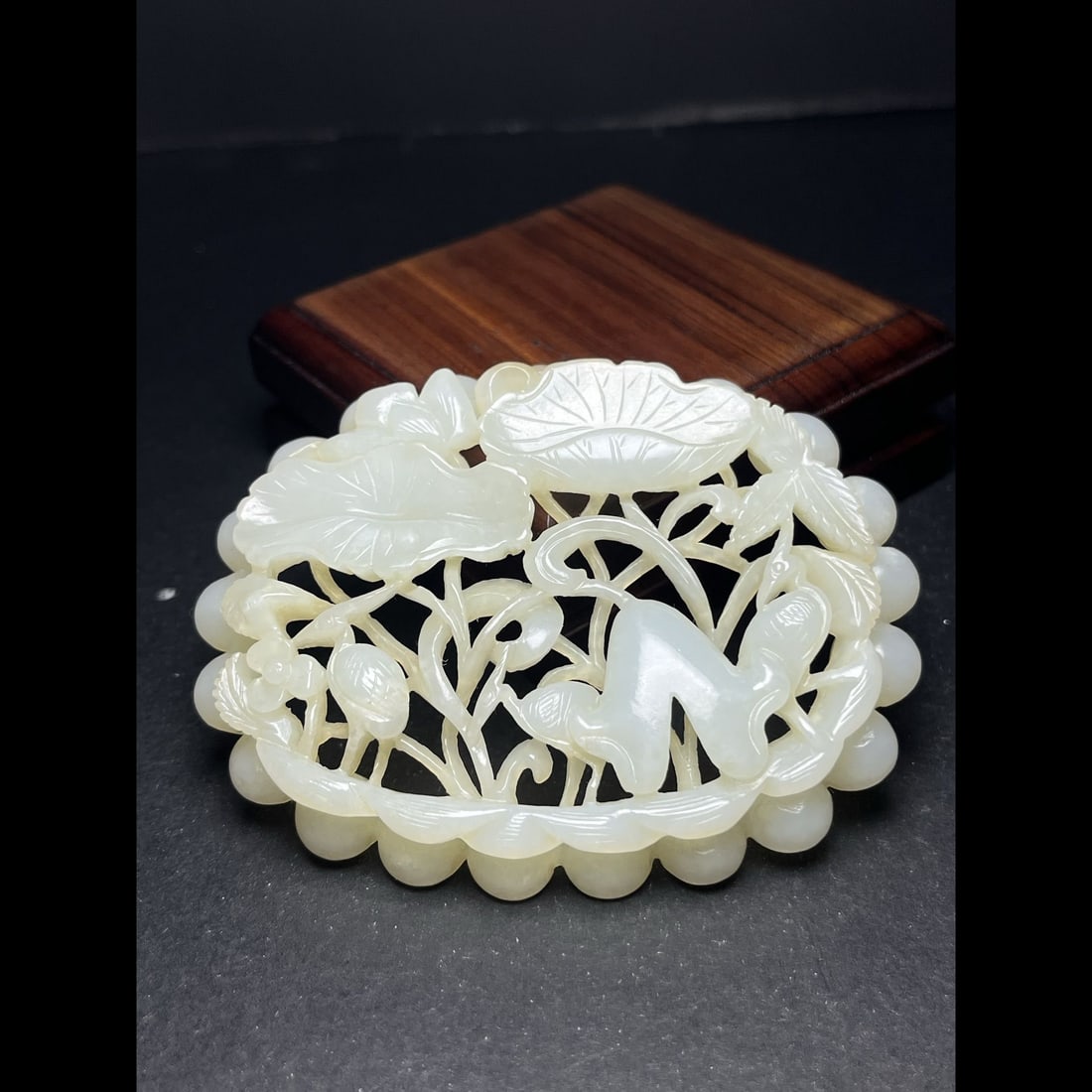 An Exquisite Hotan Jade Crane Ornament: An Exquisite Hotan Jade Crane Ornament,Qing Dynasty, China,Size:3.5inx0.4inx2.7in,Weight:60g 和田玉鹤配饰,中国清代
