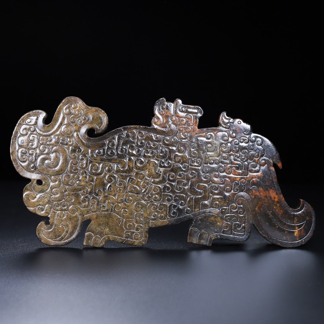 An Exquisite Hotan Jade Tiger Ornament: An Exquisite Hotan Jade Tiger Ornament,Han Dynasty, China,Size:9.9inx4.7inx0.3in,Weight:427.5g 和田玉虎,中国汉代