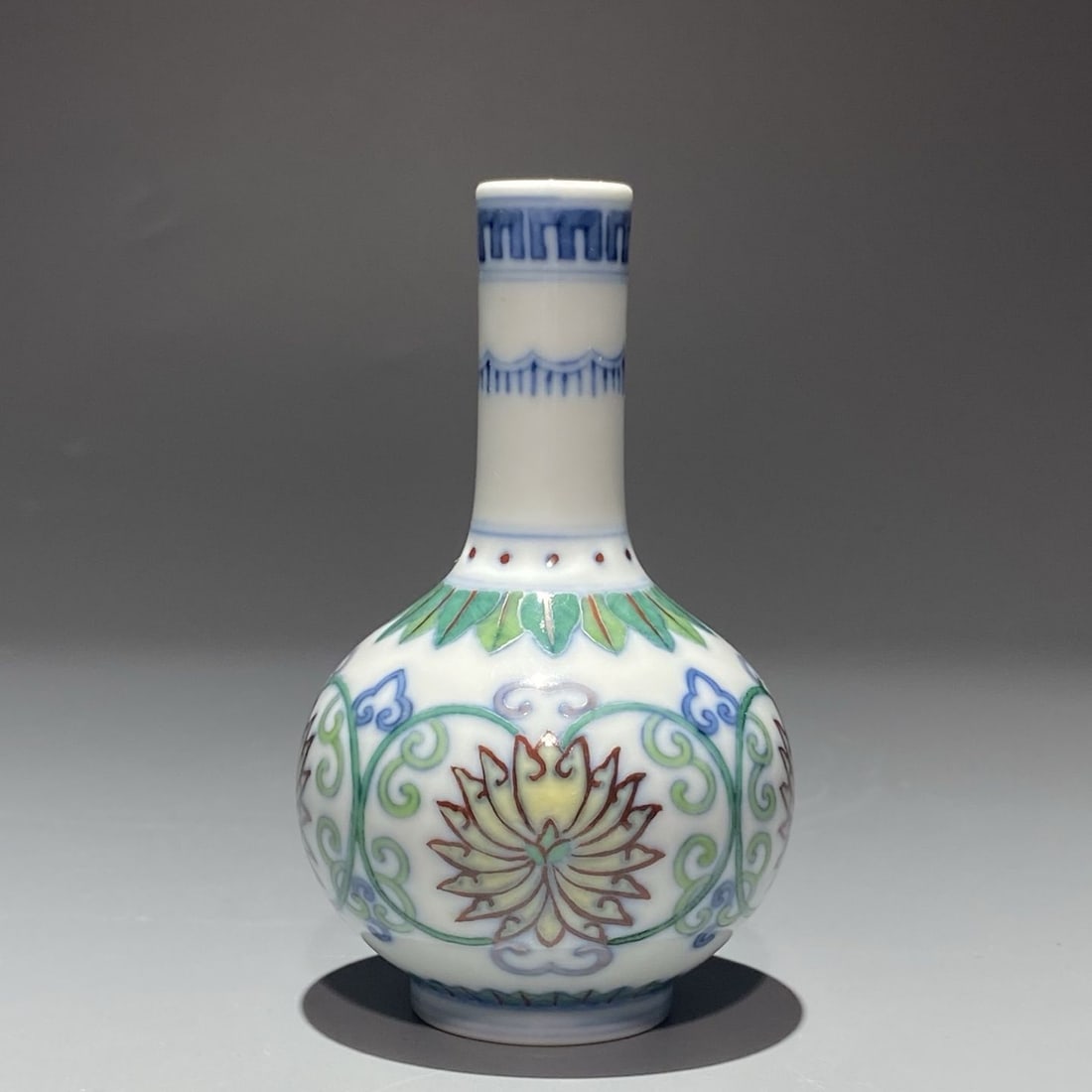 An Exquisite Doucai Lotus Pattern Vase: An Exquisite Doucai Lotus Pattern Vase,Qing Dynasty, China,Yongzheng Six-character Mark,Size:4.3inx2.6in