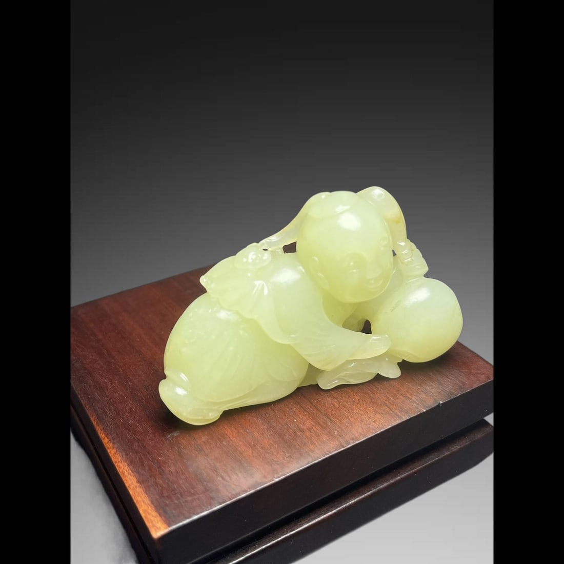 An Exquisite Hotan Jade Human Shaped Handheld Carving: An Exquisite Hotan Jade Human Shaped Handheld Carving,Qing Dynasty, China,Size:2.5inx0.8inx1.7in,Weight:74g