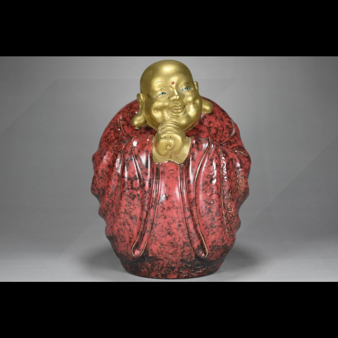An Exquisite Ruby Red Glazed Gilt Arhat Ornament: An Exquisite Ruby Red Glazed Gilt Arhat Ornament,Qing Dynasty, China,Yongzheng Four-character Mark,Size:7.5inx5.9in 宝石红釉鎏金罗汉摆件,