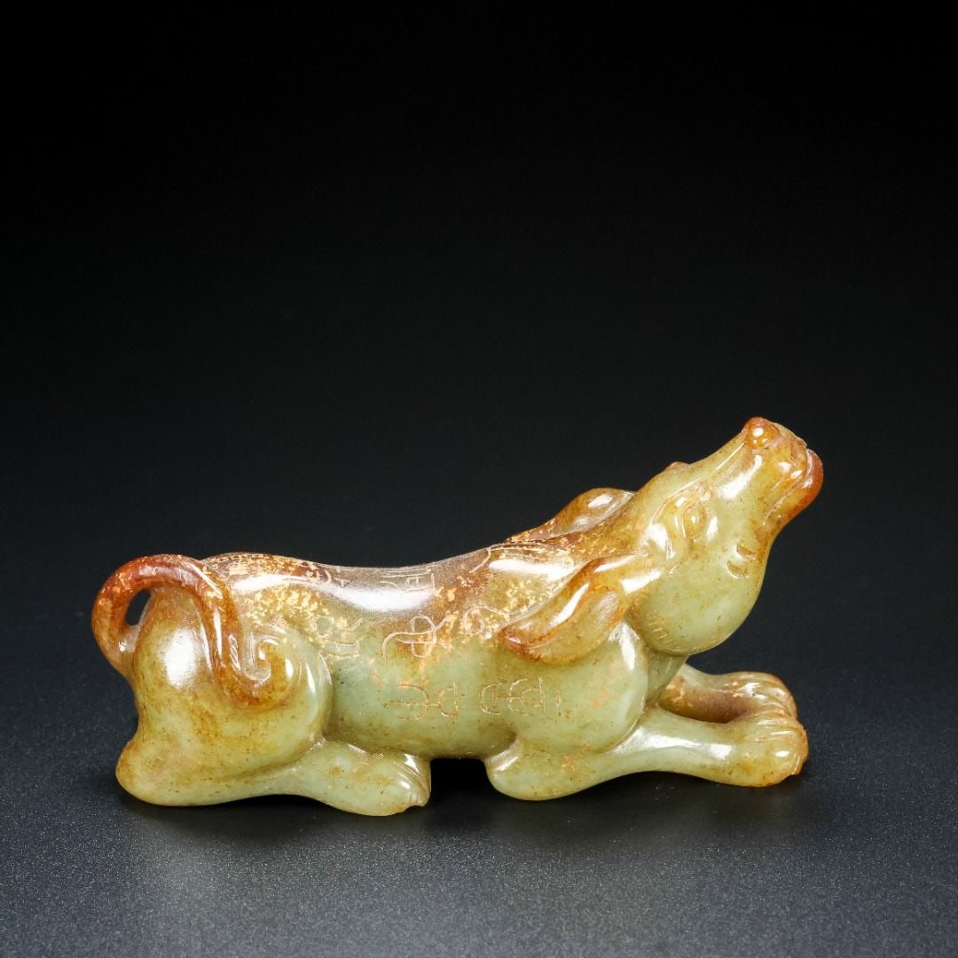 An Exquisite Hotan Jade Buffalo: An Exquisite Hotan Jade Buffalo,Qing Dynasty, China,Size:3.3inx1.2inx1.8in,Weight:128g 和田玉牛,中国清代