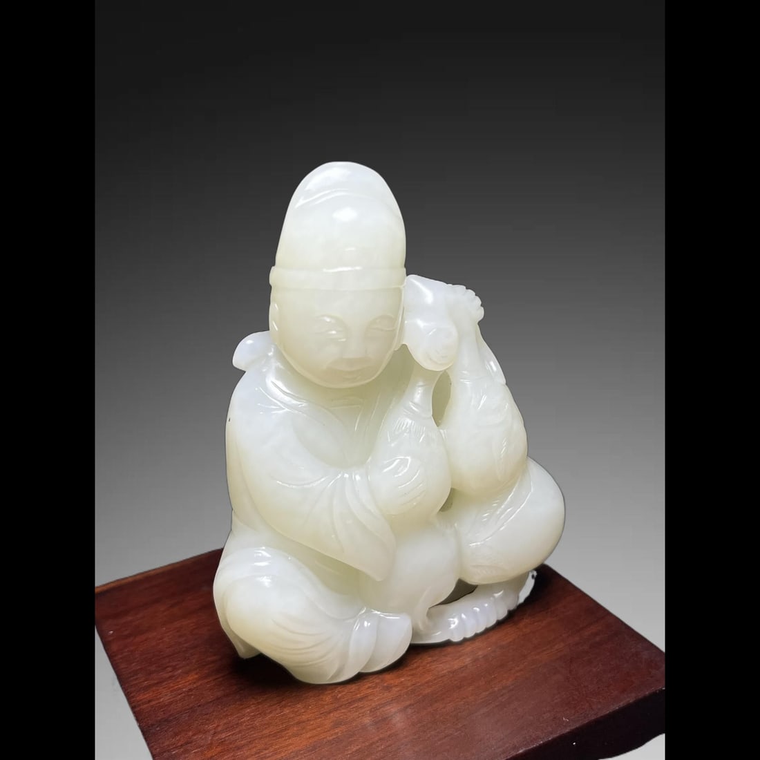 An Exquisite Hotan Jade Figures Handheld Carving: An Exquisite Hotan Jade Figures Handheld Carving,Qing Dynasty, China,Size:3.1inx0.8inx2.4in,Weight:139g