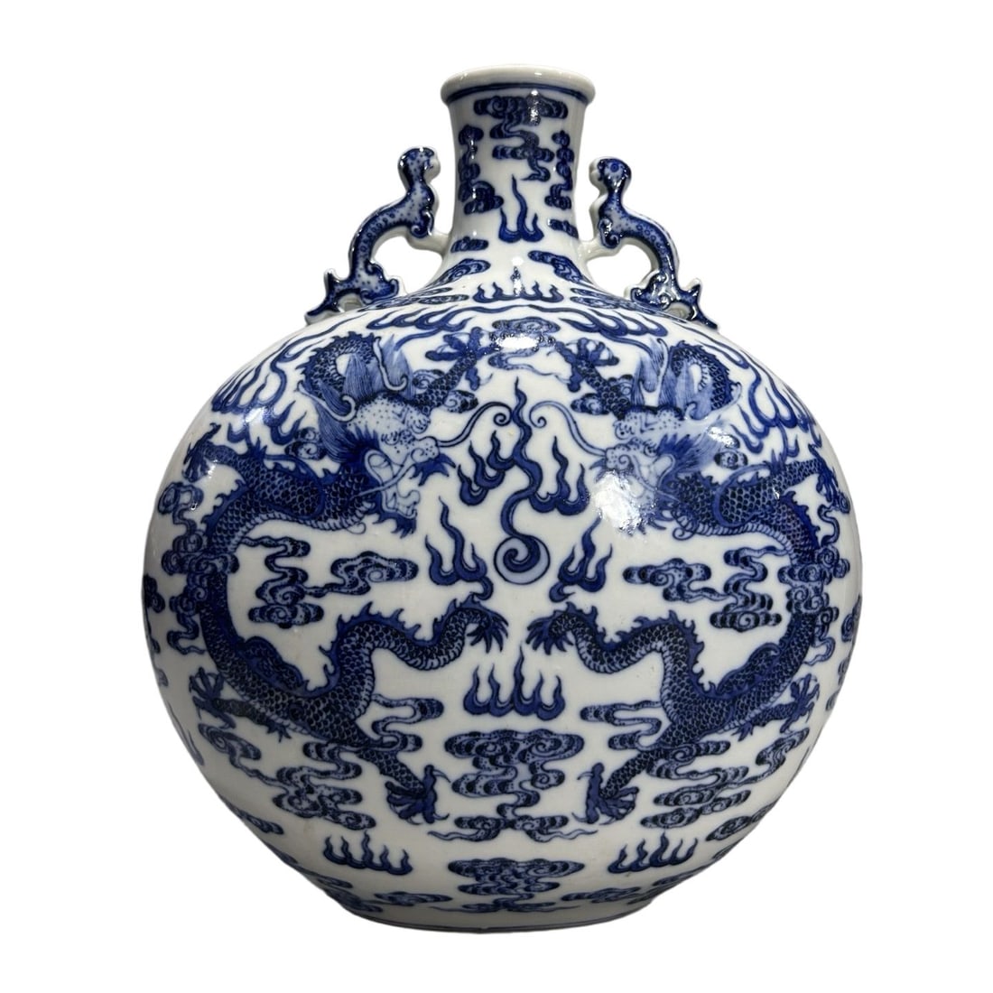 An Exquisite Blue and White Dragon Pattern Vase: An Exquisite Blue and White Dragon Pattern Vase,Qing Dynasty, China,Qianlong Six-character Mark,Size:8.7inx11.4in 青花龙纹瓶,中国清代,乾&