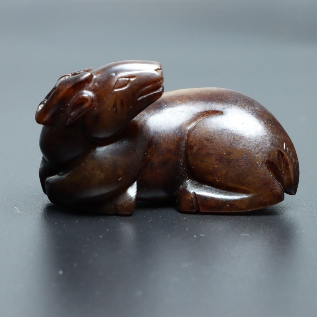 An Exquisite Hotan Jade Sika Deer Ornament: An Exquisite Hotan Jade Sika Deer Ornament,Han Dynasty, China,Size:2.5inx1.4inx1.2in 和田玉鹿摆件,中国汉代