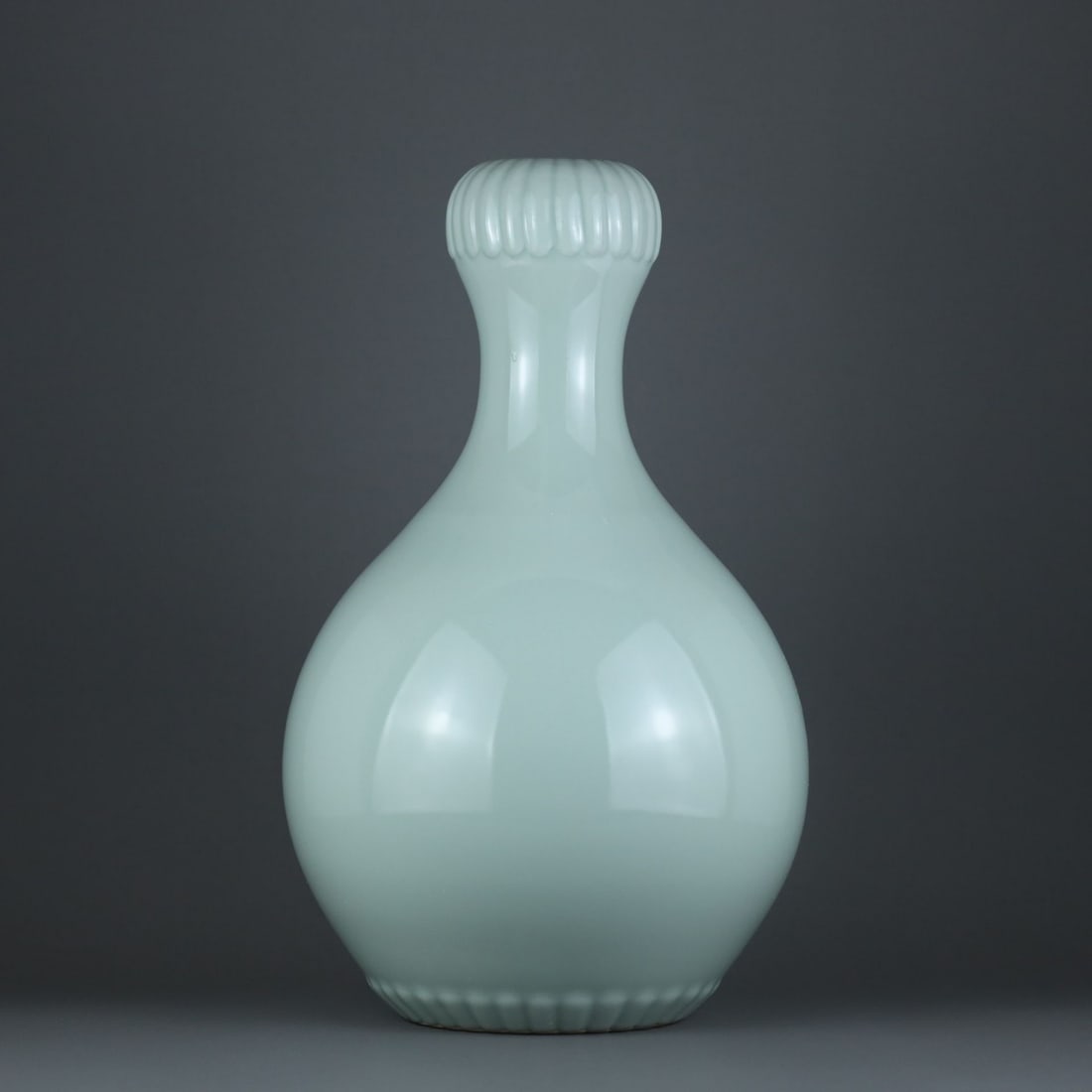 An Exquisite Sky Blue Glazed Vase: An Exquisite Sky Blue Glazed Vase,Qing Dynasty, China,Qianlong Six-character Mark,Size:15.9inx9.8in