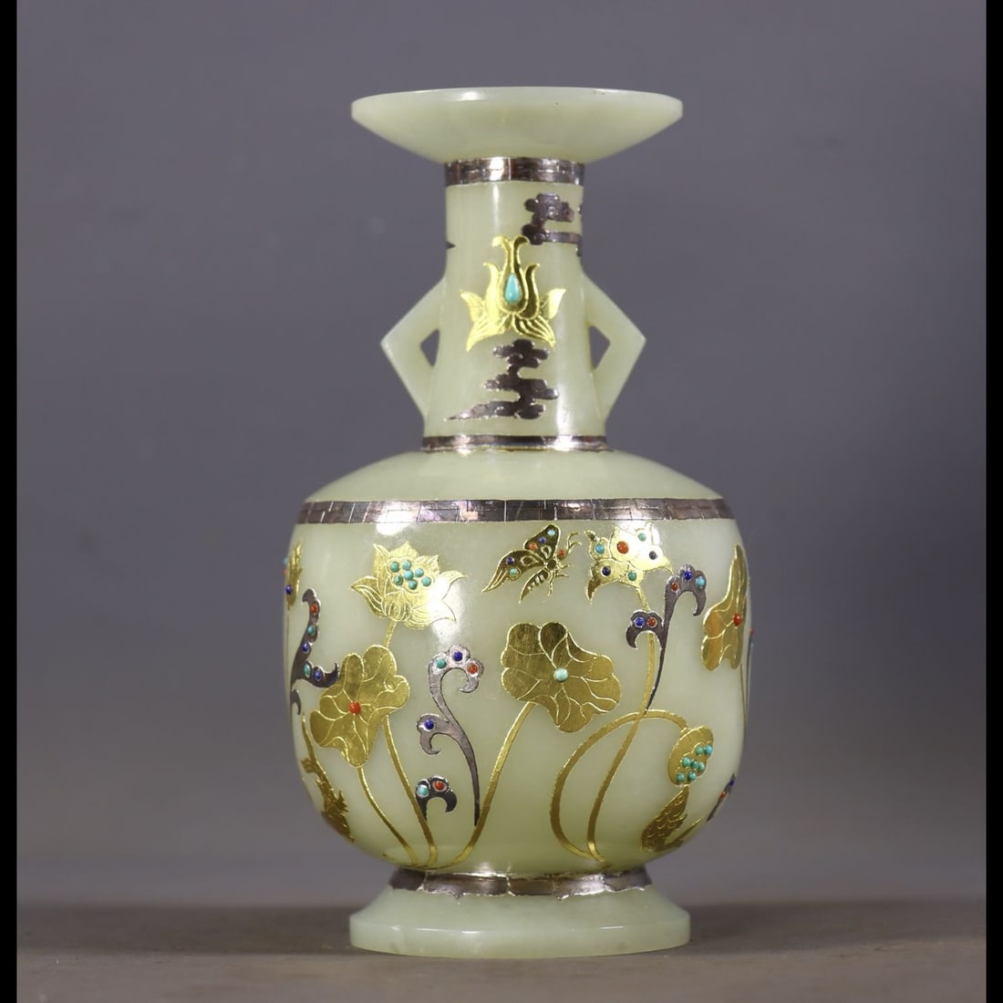 An Exquisite Hotan Celadon-White Jade Gold and Silver-Inlaid Gems Lotus Leaf Pattern Double-Ears: An Exquisite Hotan Celadon-White Jade Gold and Silver-Inlaid Gems Lotus Leaf Pattern Double-Ears Vase,Qing Dynasty, China,Size:6.3inx3in,Weight:329g 和田青白玉错