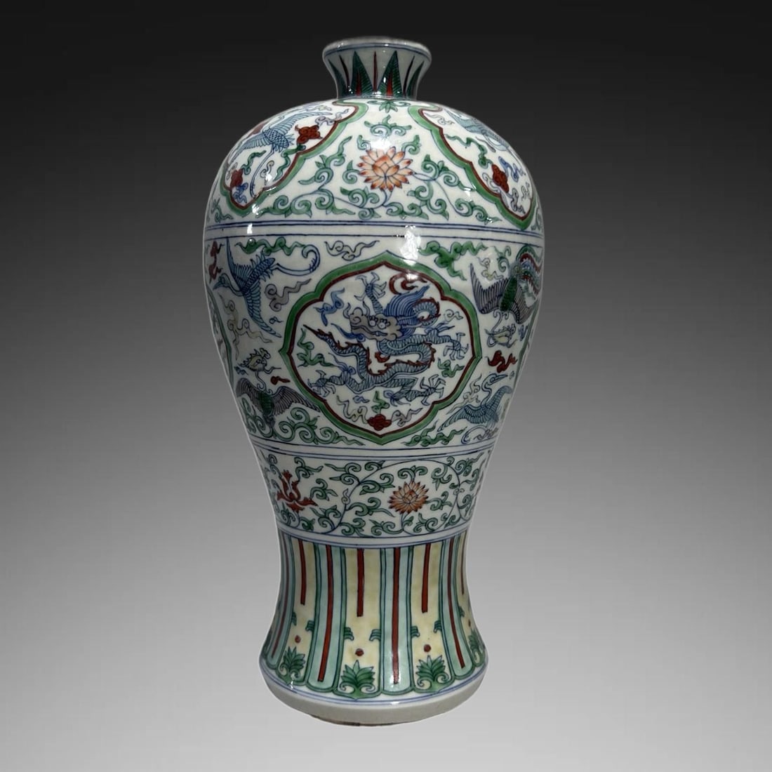 An Exquisite Wucai Dragon Pattern Vase: An Exquisite Wucai Dragon Pattern Vase,Ming Dynasty, China,Longqing Six-character Mark,Size:12.6inx5.5in 五彩龙纹瓶,中国明代,隆庆Ð