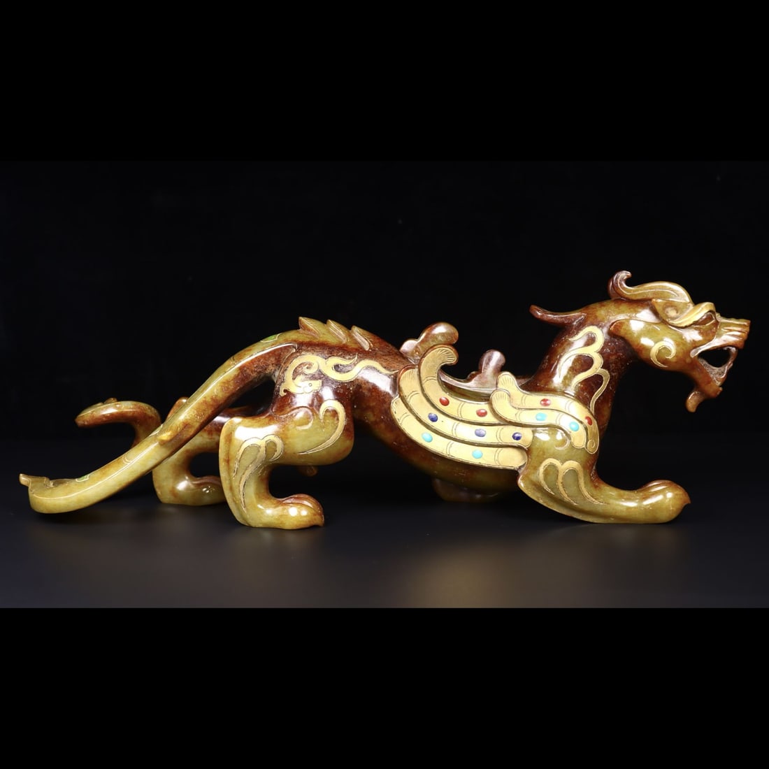An Exquisite Hotan Jade Inlaid Gems Auspicious Beast Ornament: An Exquisite Hotan Jade Inlaid Gems Auspicious Beast Ornament,Han Dynasty, China,Size:14.2inx3inx4.7in,Weight:1964g