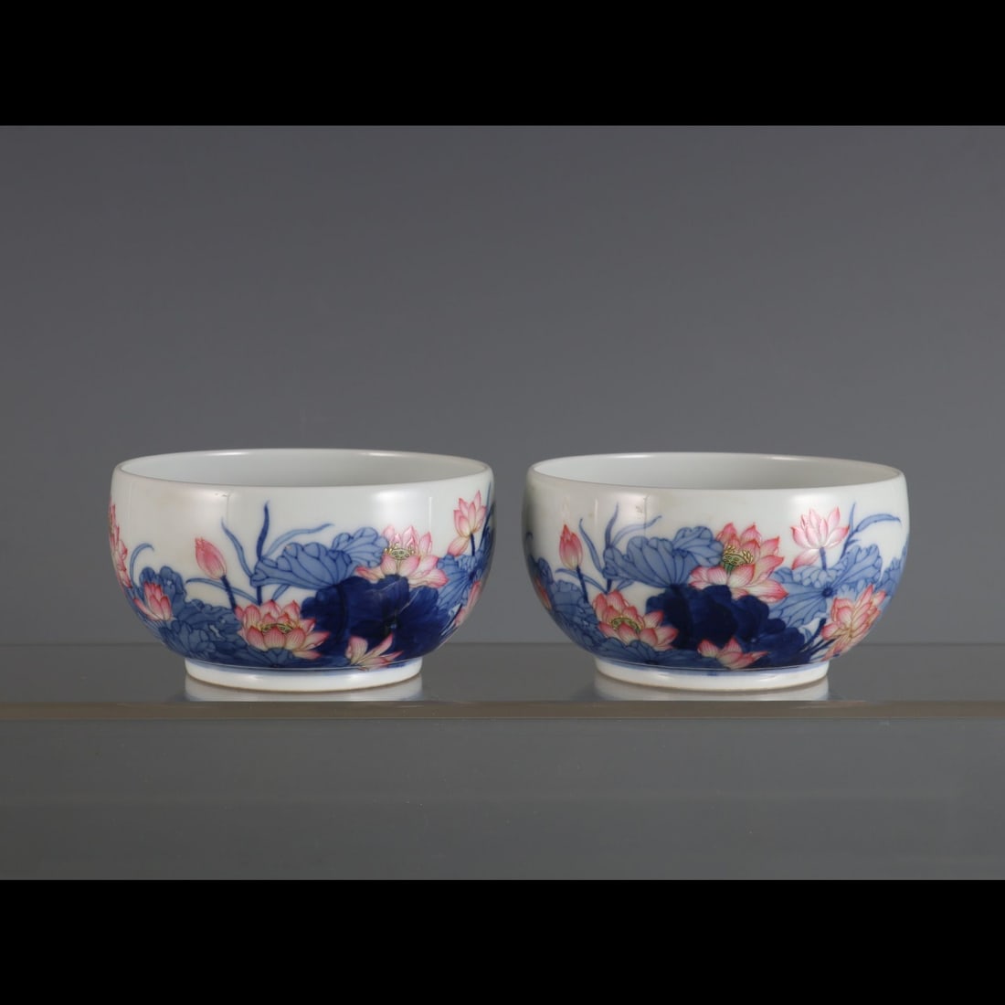 A pair of Exquisite Blue and White Famille-Rose Lotus Pattern Cup: A pair of Exquisite Blue and White Famille-Rose Lotus Pattern Cup,Qing Dynasty, China,Yongzheng Six‑character Mark,Size:2.1inx3.6in 一对青花粉彩荷഑