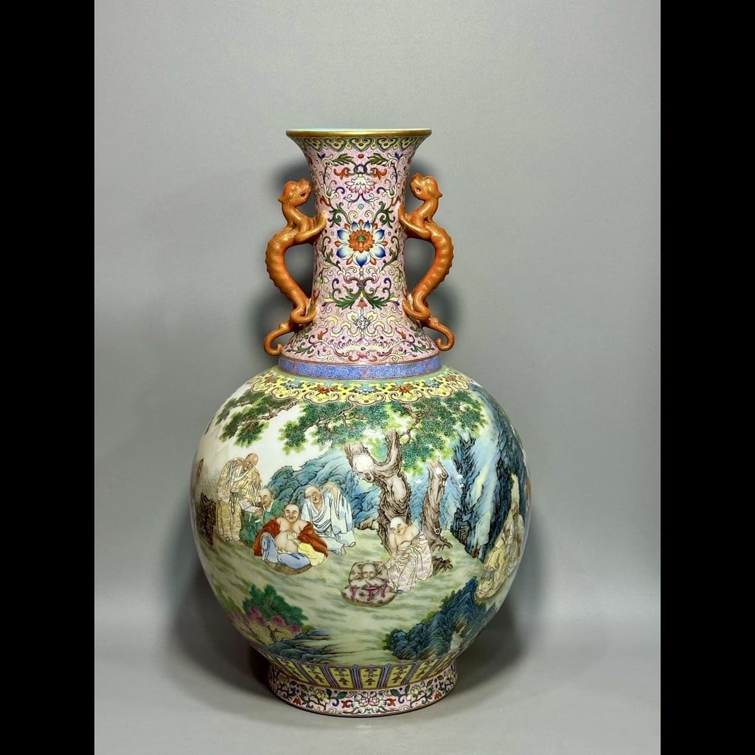 An Exquisite Famille-Rose Arhat Double-Ears Vase: An Exquisite Famille-Rose Arhat Double-Ears Vase,Qing Dynasty, China,Qianlong Six-character Mark,Size:20.5inx5.1inx13.1inx7.1in