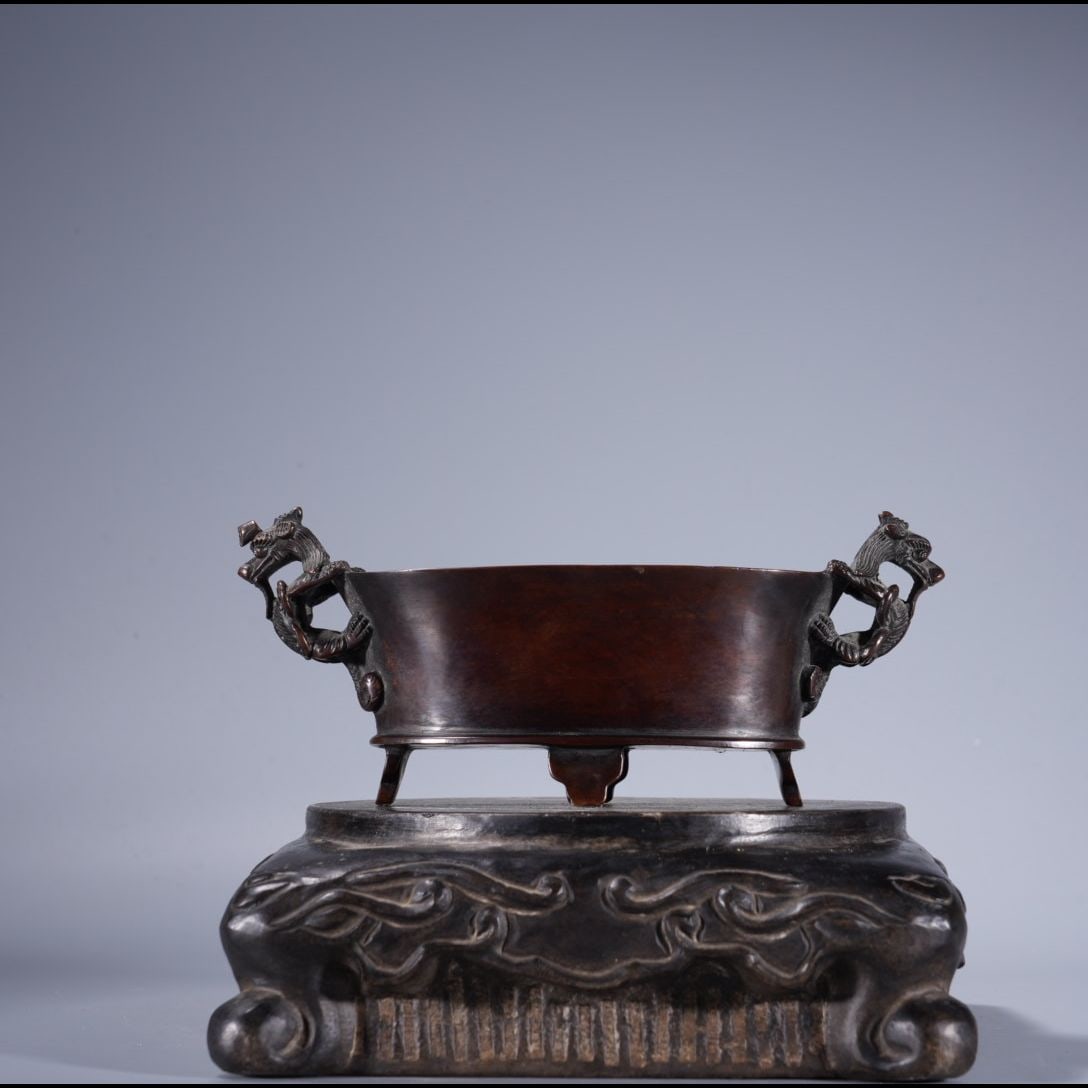 An Exquisite Purple Copper Dragon‑Ears Censer: An Exquisite Purple Copper Dragon‑Ears Censer,Qing Dynasty, China,With Mark,Size:3.3in,Weight:935g 紫铜龙耳炉,中国清代,带款