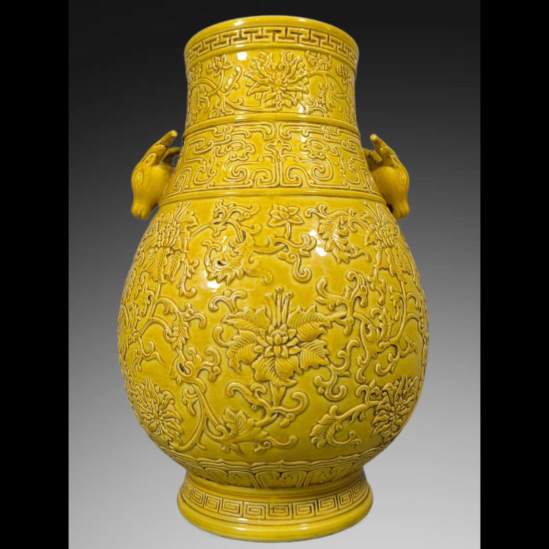 An Exquisite Yellow Glazed Flower Pattern Deer Head Vase: An Exquisite Yellow Glazed Flower Pattern Deer Head Vase,Qing Dynasty, China,Kangxi Six-character Mark,Size:11.8inx8.3in