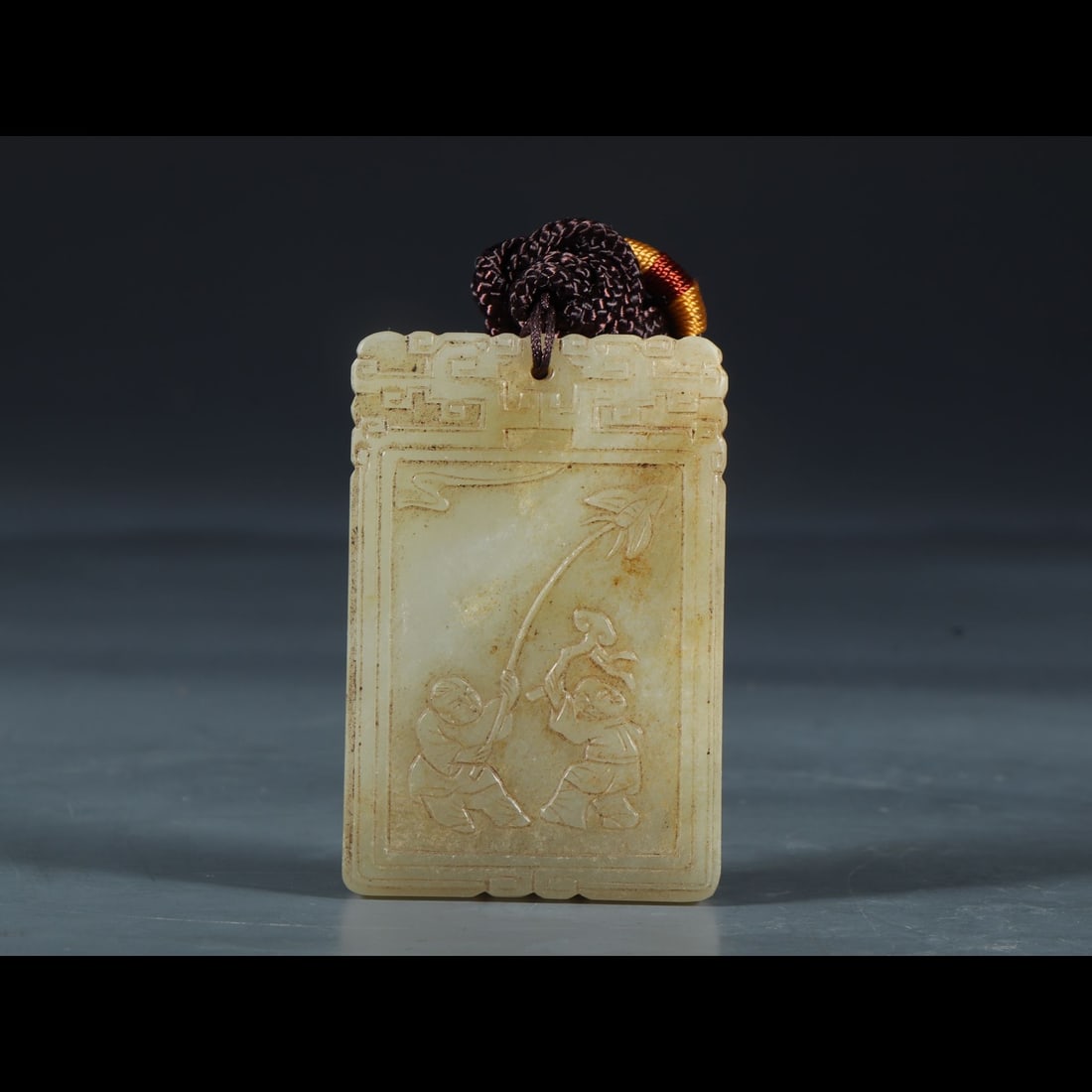 An Exquisite Hotan Jade Figures‑Pattern Plaque: An Exquisite Hotan Jade Figures‑Pattern Plaque,Ming Dynasty, China,Size:2.4inx1.6inx0.3in,Weight:49g 和田玉人物纹牌,中国明代