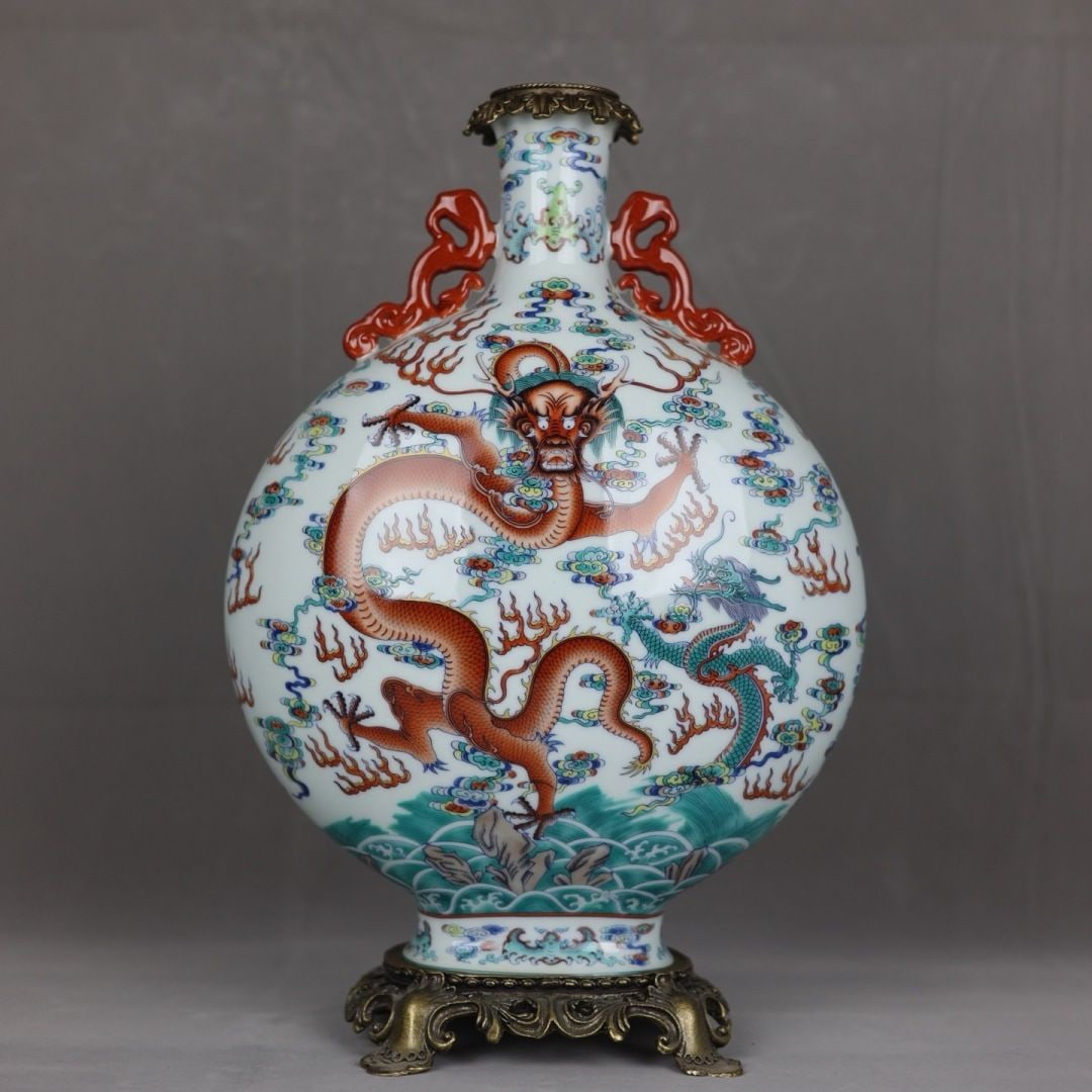 An Exquisite Doucai Dragon Pattern Copper-Inlaid Double-Ears Vase: An Exquisite Doucai Dragon Pattern Copper-Inlaid Double-Ears Vase,Qing Dynasty, China,Qianlong Six-character Mark,Size:16.1inx3.1inx10.2inx6.1in 斗彩龙纹镶铜双