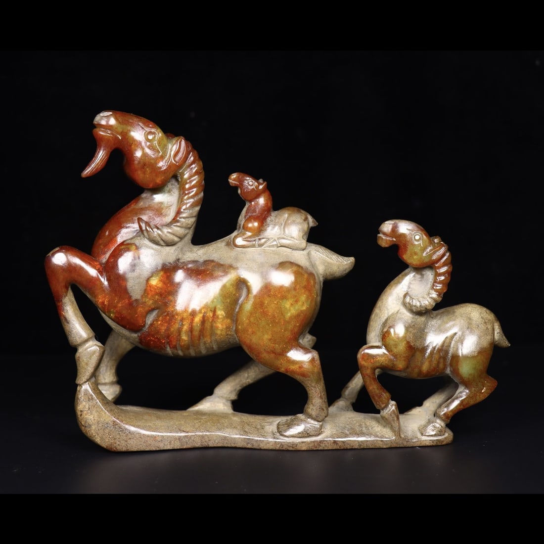 An Exquisite Hotan Jade Sheep Ornament: An Exquisite Hotan Jade Sheep Ornament,Han Dynasty, China,Size:8inx2.4inx1.9in,Weight:1101g 和田玉羊摆件,中国汉代
