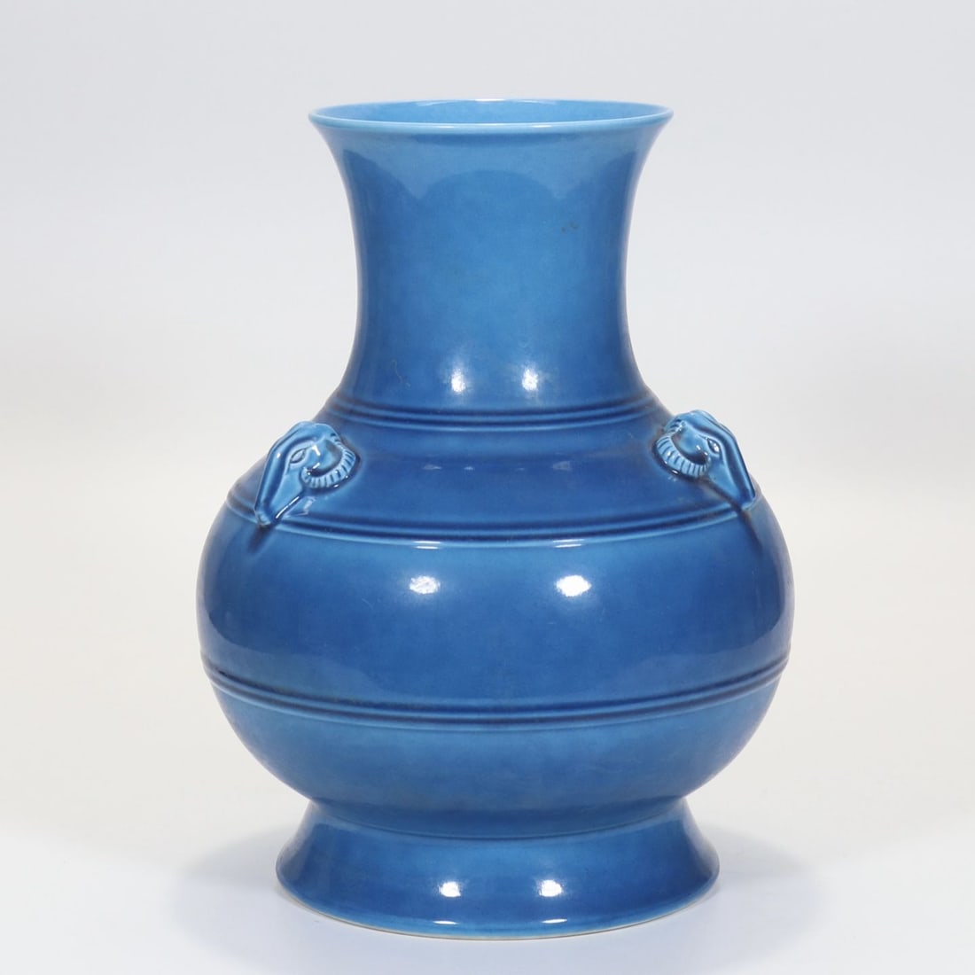 An Exquisite Peacock-Blue Glazed Sheep-Head String Pattern Vase: An Exquisite Peacock-Blue Glazed Sheep-Head String Pattern Vase,Qing Dynasty, China,Qianlong Six‑character Mark,Size:11.3inx5.2in 孔雀蓝釉羊首弦纹