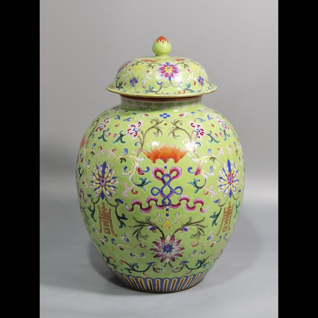 An Exquisite Green Ground Lotus Pattern Jar: An Exquisite Green Ground Lotus Pattern Jar,Qing Dynasty, China,Jiaqing Six‑character Mark,Size:11.2inx3.8inx7.9in