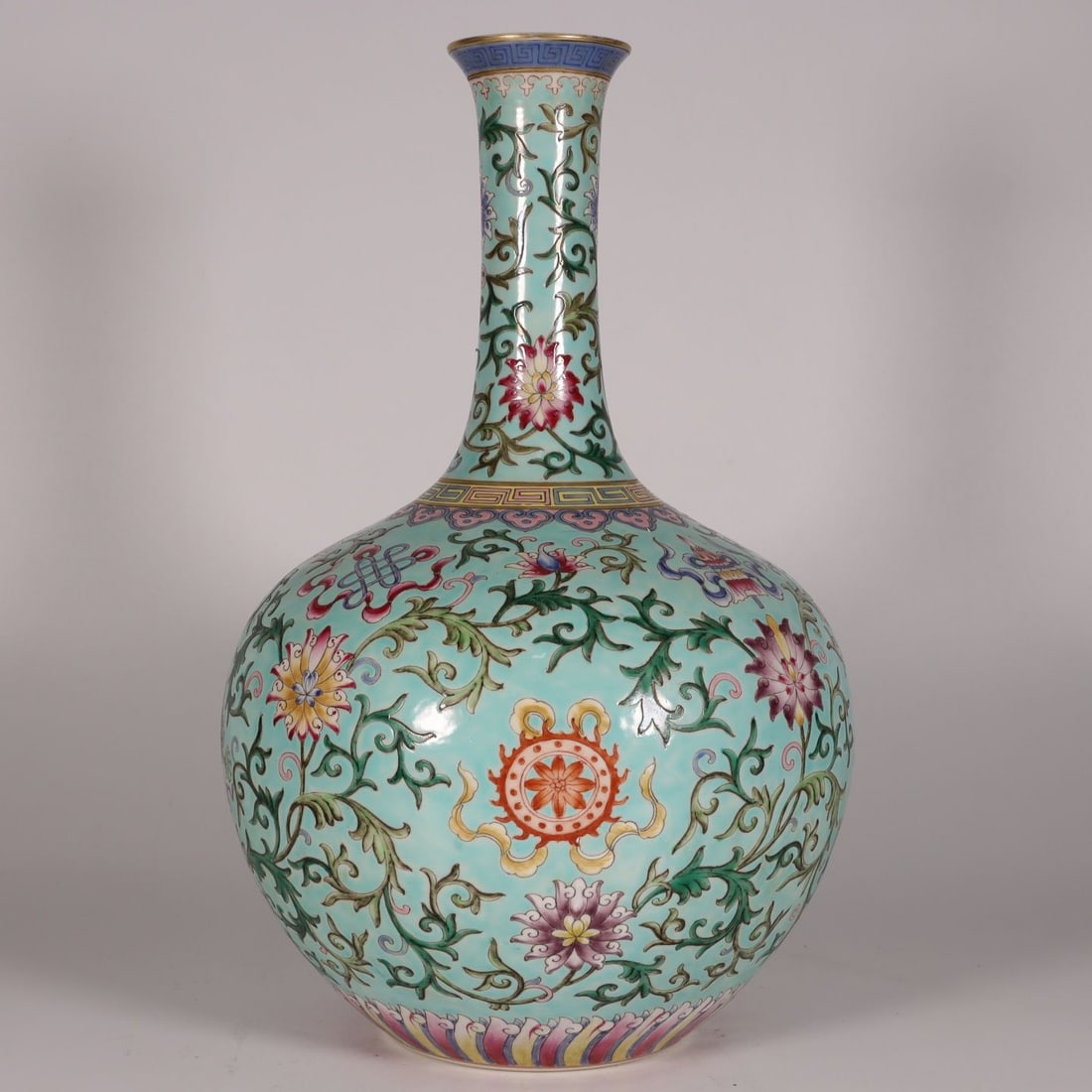 An Exquisite Turquoise-Glazed Green Ground Famille-Rose Eight Treasures Pattern Vase: An Exquisite Turquoise-Glazed Green Ground Famille-Rose Eight Treasures Pattern Vase,Qing Dynasty, China,Qianlong Six-character Mark,Size:13.4inx7.9in 松石绿地粉彩&