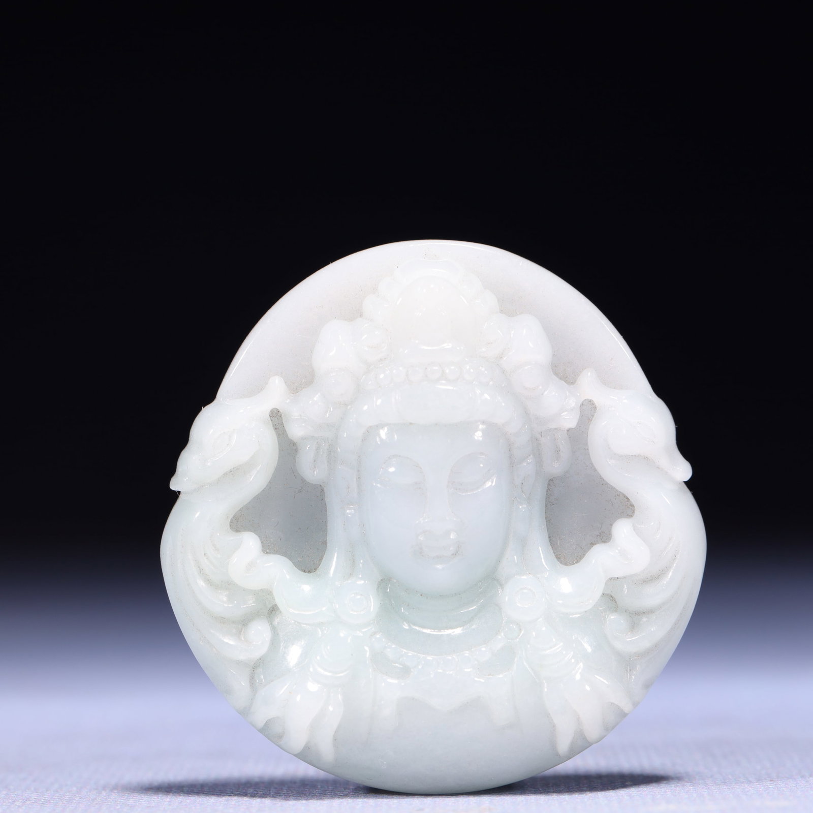 An Exquisite Jadeite Statue of Avalokitesvara Pendant: An Exquisite Jadeite Statue of Avalokitesvara Pendant,Qing Dynasty,China,Size:2inx0.4in,Weight:57g 翡翠观音像挂件,中国清代