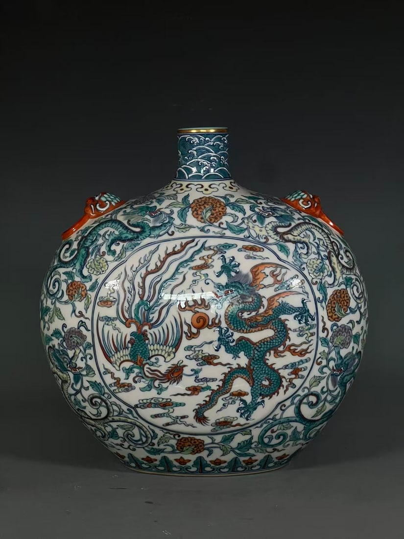 A Rare Doucai Painted Gold Auspicious Cloud,Dragon and Phoenix Pattern Beast-Ears Vase: A Rare Doucai Painted Gold Auspicious Cloud,Dragon and Phoenix Pattern Beast-Ears Vase,Qing Dynasty,China,Qianlong Six-character Mark,Size:11.8inx1.7inx5.8in 斗彩描金祥&#