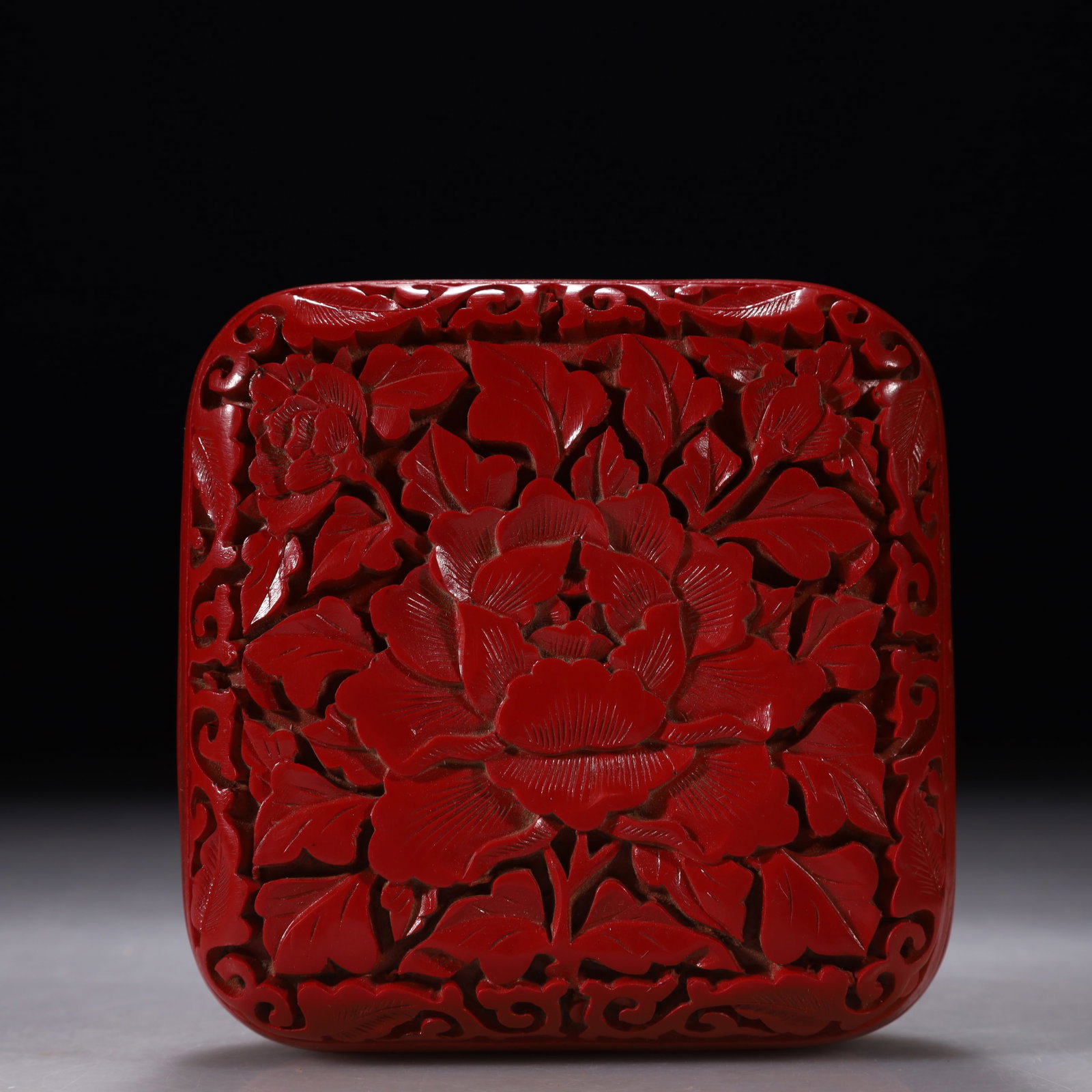A Carved Cinnabar Lacquer Canted-Corner Square Box with Floral Motif (1 of 8)