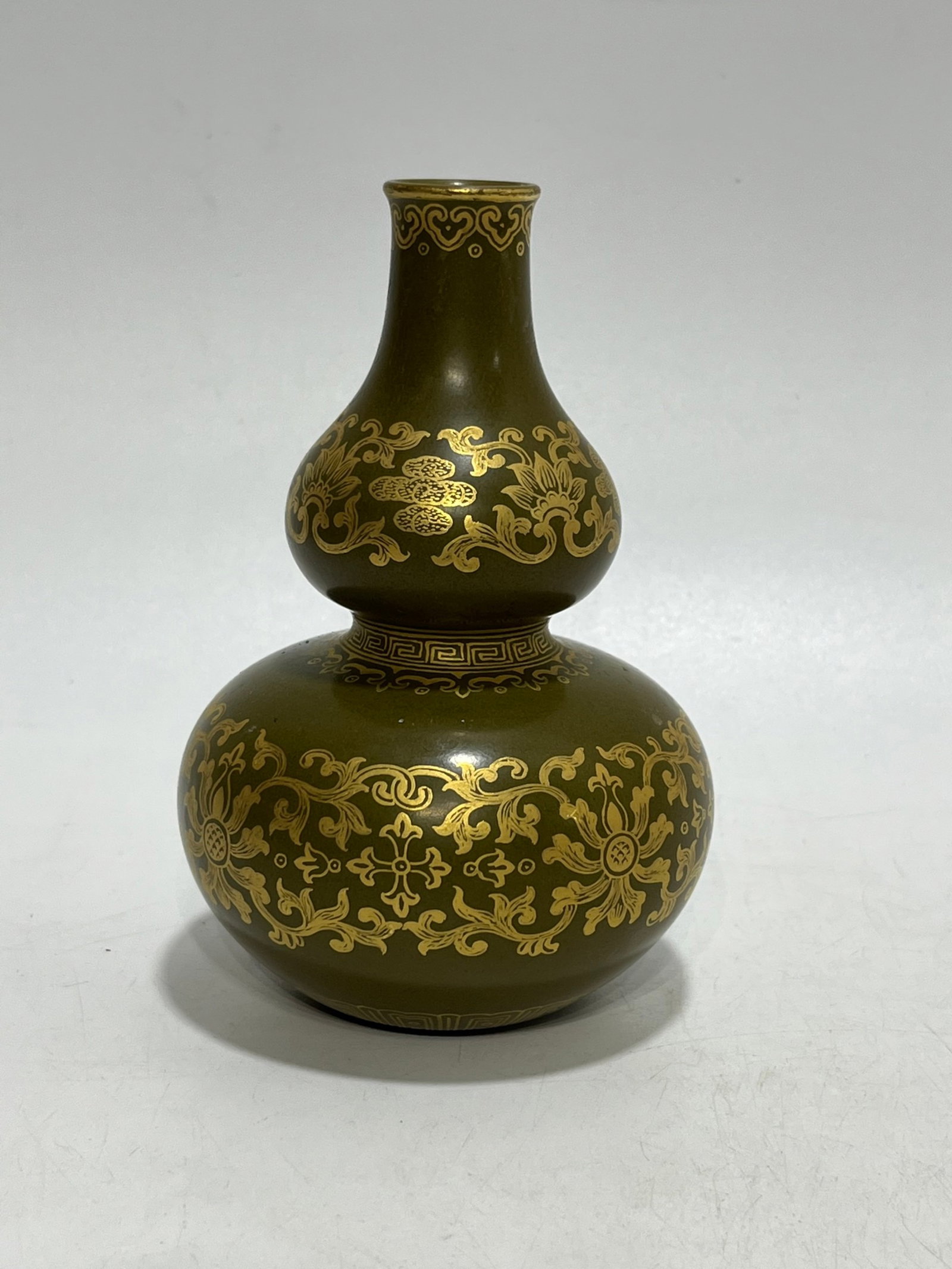 An Exquisite Teadust Glazed Painted Gold Lotus Pattern Gourd Vase: An Exquisite Teadust Glazed Painted Gold Lotus Pattern Gourd Vase,Qing Dynasty,China,Qianlong Four-character Mark,Size:5.1in