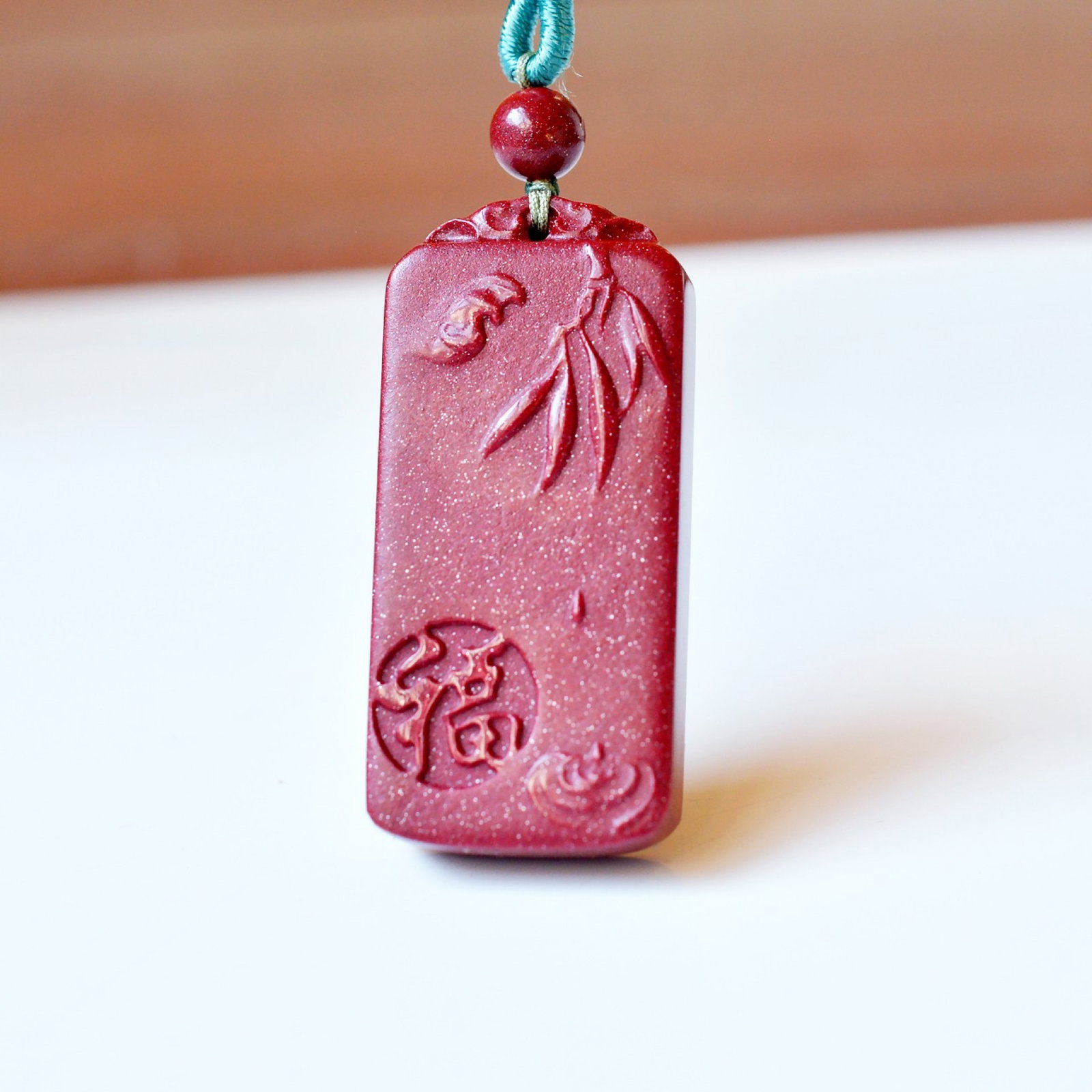 An Exquisite Cinnabar Fu-Character Pattern Pendant: An Exquisite Cinnabar Fu-Character Pattern Pendant,Size:0.7inx1.6in,Weight:19g 朱砂福字纹挂件