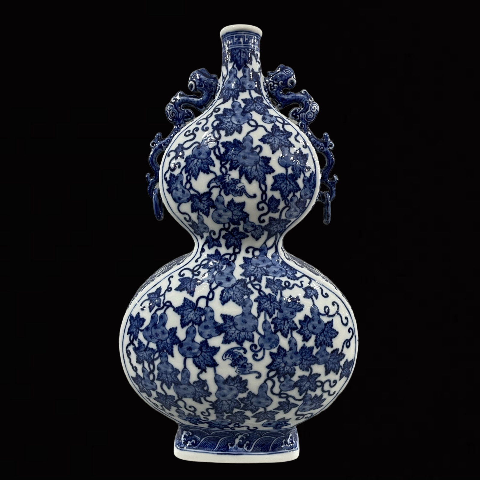 A Huge Blue and White Gourd Pattern Gourd-Shaped Vase: A Huge Blue and White Gourd Pattern Gourd-Shaped Vase,Qing Dynasty,China,Qianlong Six-character Mark,Size:16.9inx9.1in