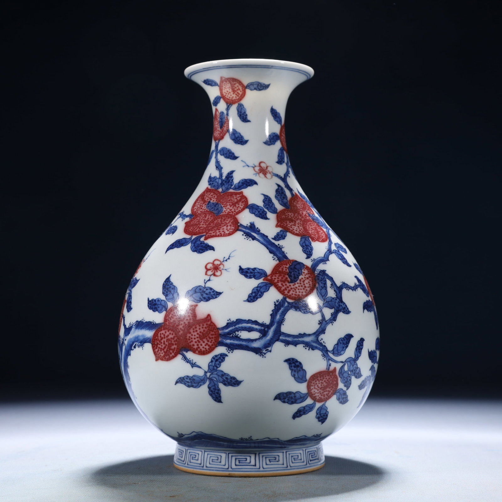 An Exquisite Blue and White Underglaze-Red Flower and Fruit Pattern Vase: An Exquisite Blue and White Underglaze-Red Flower and Fruit Pattern Vase,Qing Dynasty,China,Kangxi Six-character Mark,Size:5.1inx8.3in,Weight:1250g 青花釉里红花