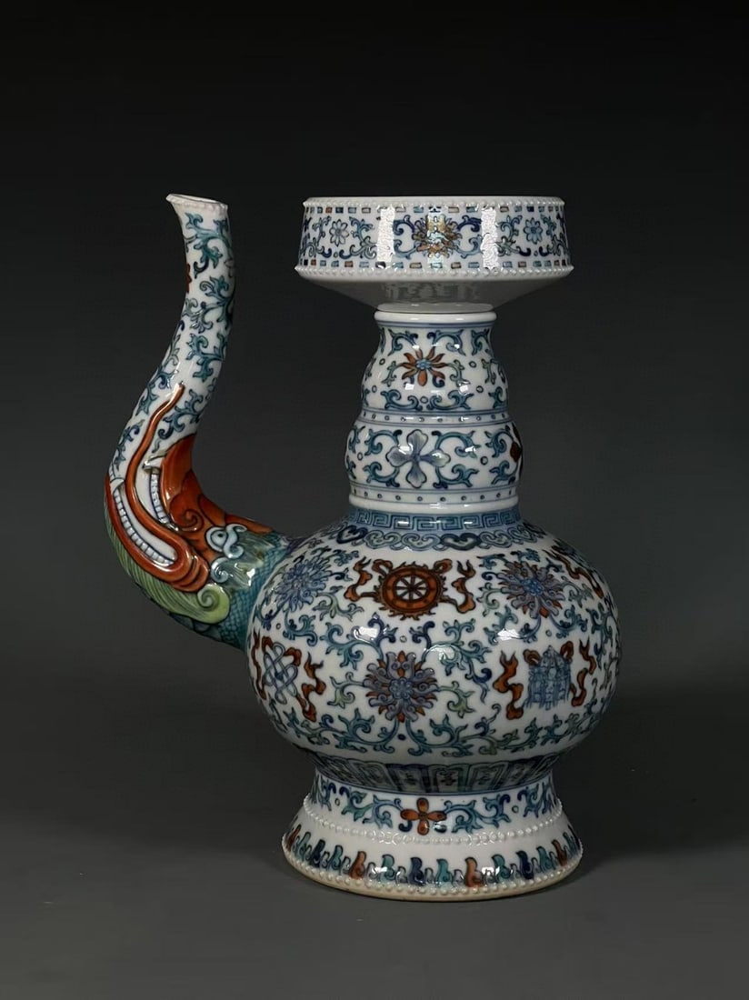A Rare Doucai Lotus and Eight Treasures Pattern Beast-head Pot: A Rare Doucai Lotus and Eight Treasures Pattern Beast-head Pot,Qing Dynasty,China,Qianlong Six-character Mark,Size:11.8inx2inx5.3in 斗彩缠枝莲八宝纹