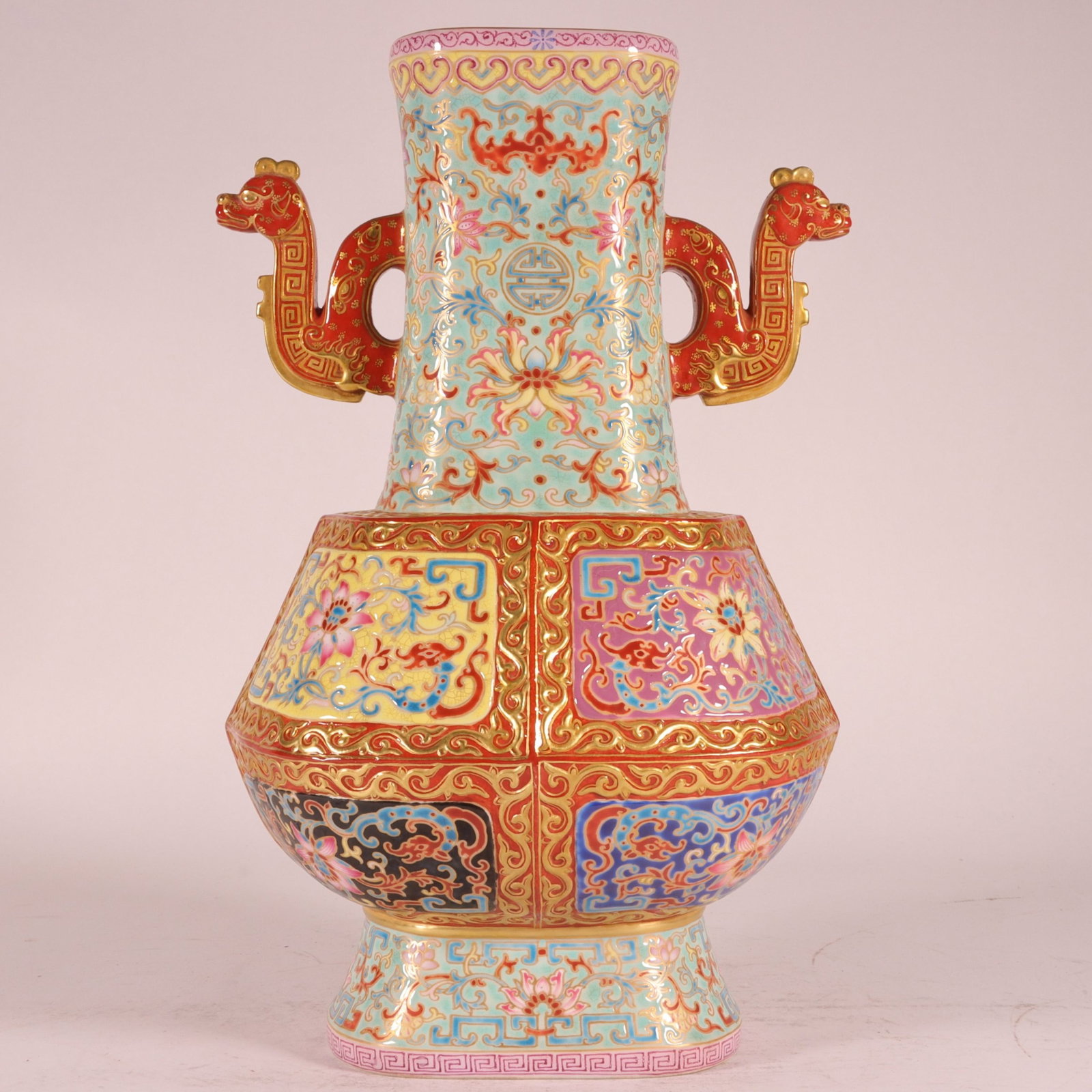 An Exquisite Green Ground Enamel Lotus Pattern Double-Ears Vase: An Exquisite Green Ground Enamel Lotus Pattern Double-Ears Vase,Qing Dynasty,China,Qianlong Four-character Mark,Size:10.9inx6.7in