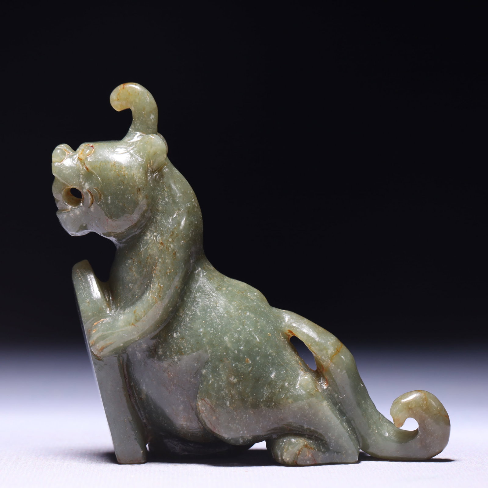 An Exquisite Green Jade Unicorn Ornament: An Exquisite Green Jade Unicorn Ornament,Qing Dynasty,China,Size:3.1inx1.2inx3.7in,Weight:210g 青玉独角兽摆件,中国清代