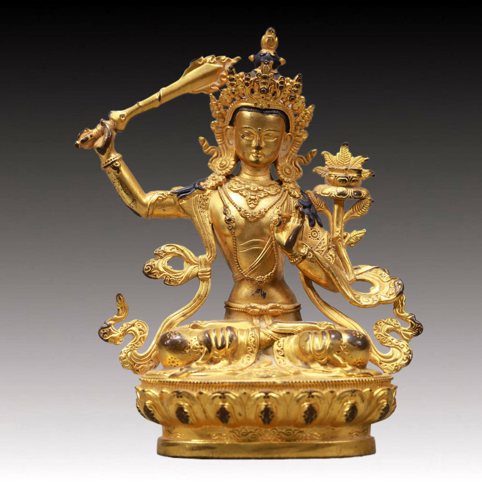 A Solemn Gilt Bronze Statue of Manjusri: A Solemn Gilt Bronze Statue of Manjusri,Qing Dynasty, China,Size:3inx1.8inx4.3inWeight:200g 铜鎏金文殊菩萨像,中国清代