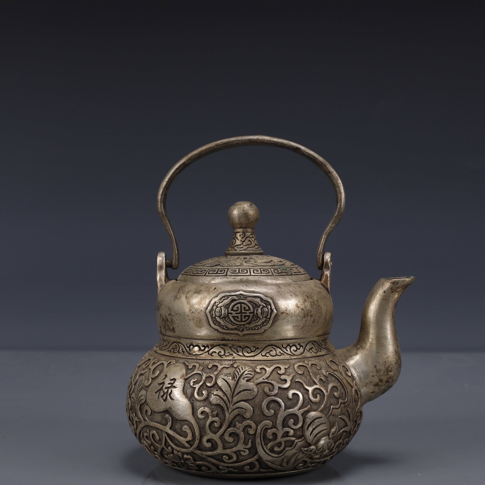 An Exquisite Silver-Plated Bronze Gourd-Shaped Ewer: An Exquisite Silver-Plated Bronze Gourd-Shaped Ewer,Qing Dynasty, China,Qianlong Four-character Mark,Size:5.1inx3.9inx5.5in,Weight:650g 铜镀银葫芦形执壶
