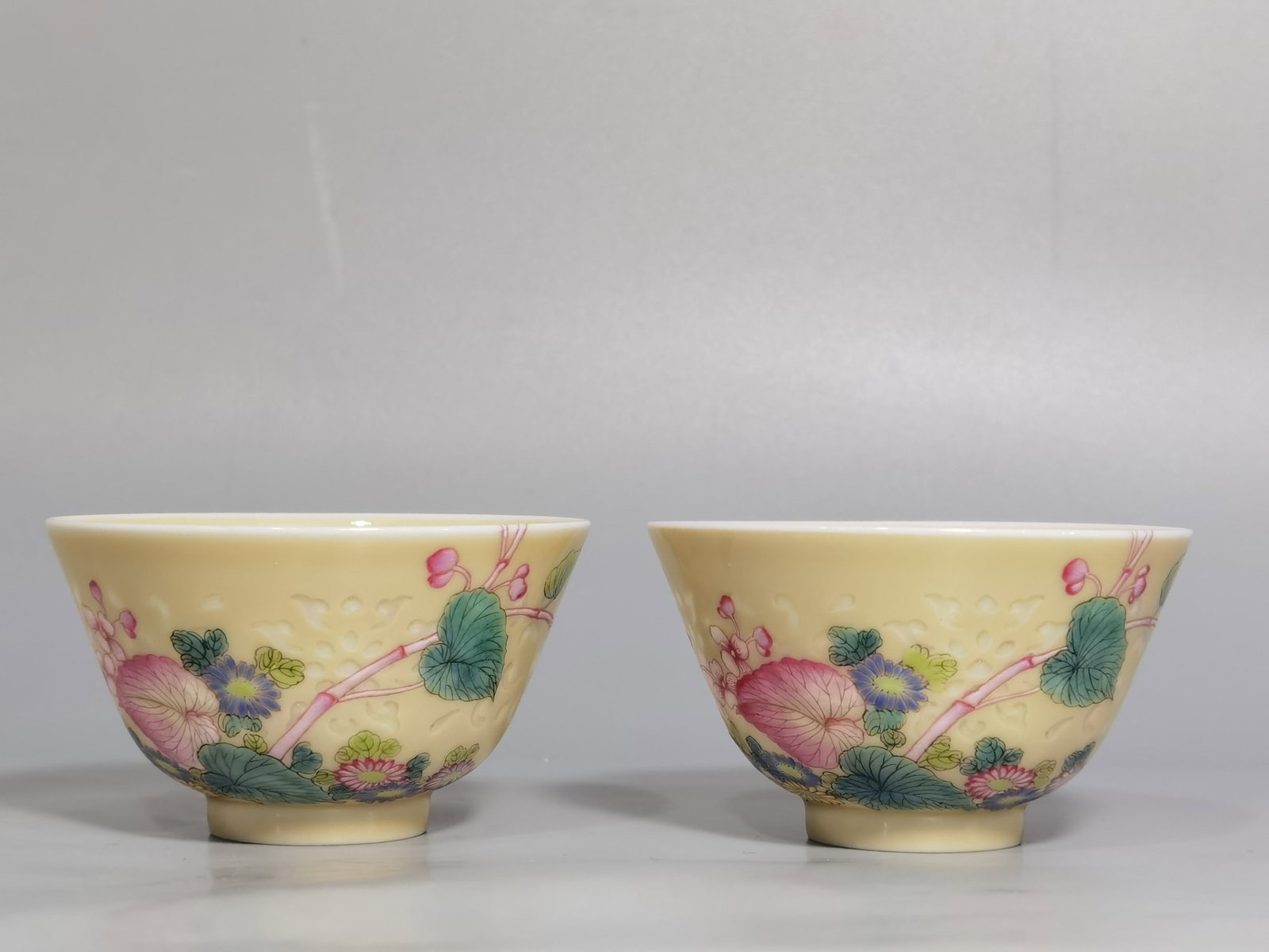 A Pair of Exquisite Yellow Glazed Famille-Rose Flower and Butterfly Pattern Cups: A Pair of Exquisite Yellow Glazed Famille-Rose Flower and Butterfly Pattern Cups,Qing Dynasty,China,Qianlong Six-character Mark,Size:7. 1.2inx1.7in 一对黄釉粉彩!