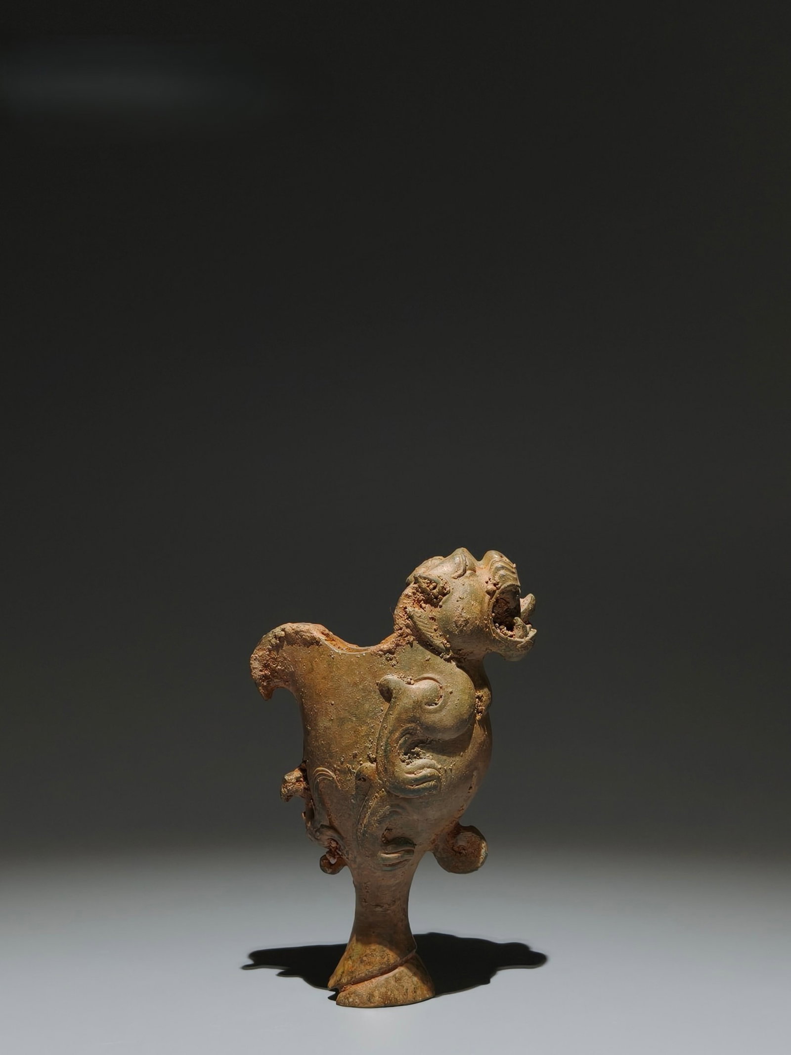 An Archaic Bronze Beast Cup: An Archaic Bronze Beast Cup,the Warring States period in China,Size:6.1inx3.9inx2in 青铜兽杯子,中国战国时期