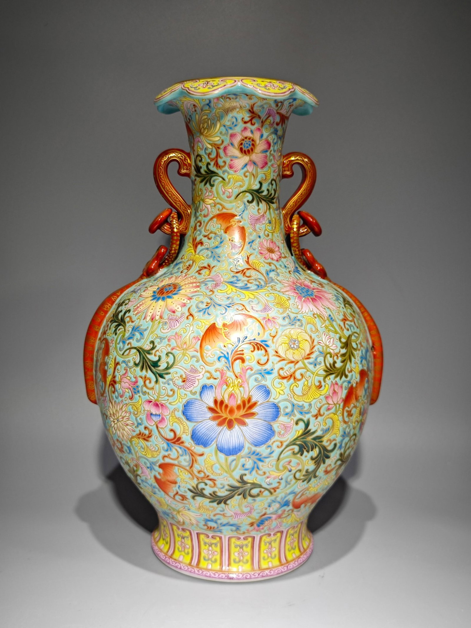 A Rare Green Ground Enamel Lotus Pattern Double-Ears Vase: A Rare Green Ground Enamel Lotus Pattern Double-Ears Vase,Qing Dynasty,China,Qianlong Four-character Mark,Size:13.9inx9.1in 绿地珐琅彩缠枝莲纹