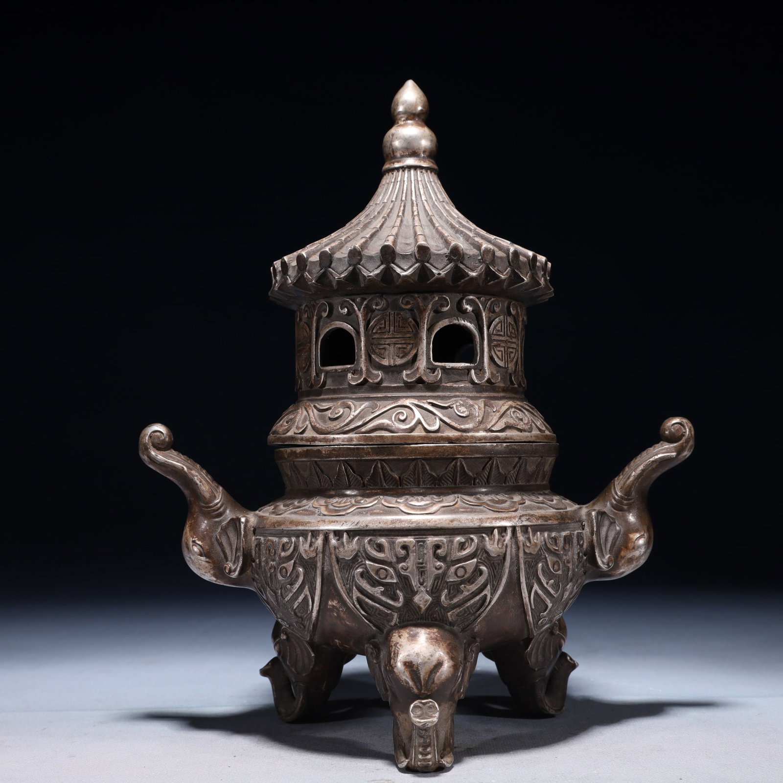 An Exquisite Silver-plated Bronze Beast-Face Pattern Elephant-Ears Tripod Censer: An Exquisite Silver-plated Bronze Beast-Face Pattern Elephant-Ears Tripod Censer,Qing Dynasty,China,Qianlong Four-character Mark,Size:9.1inx5.1inx11in,Weight:1850g 铜镀银兽&