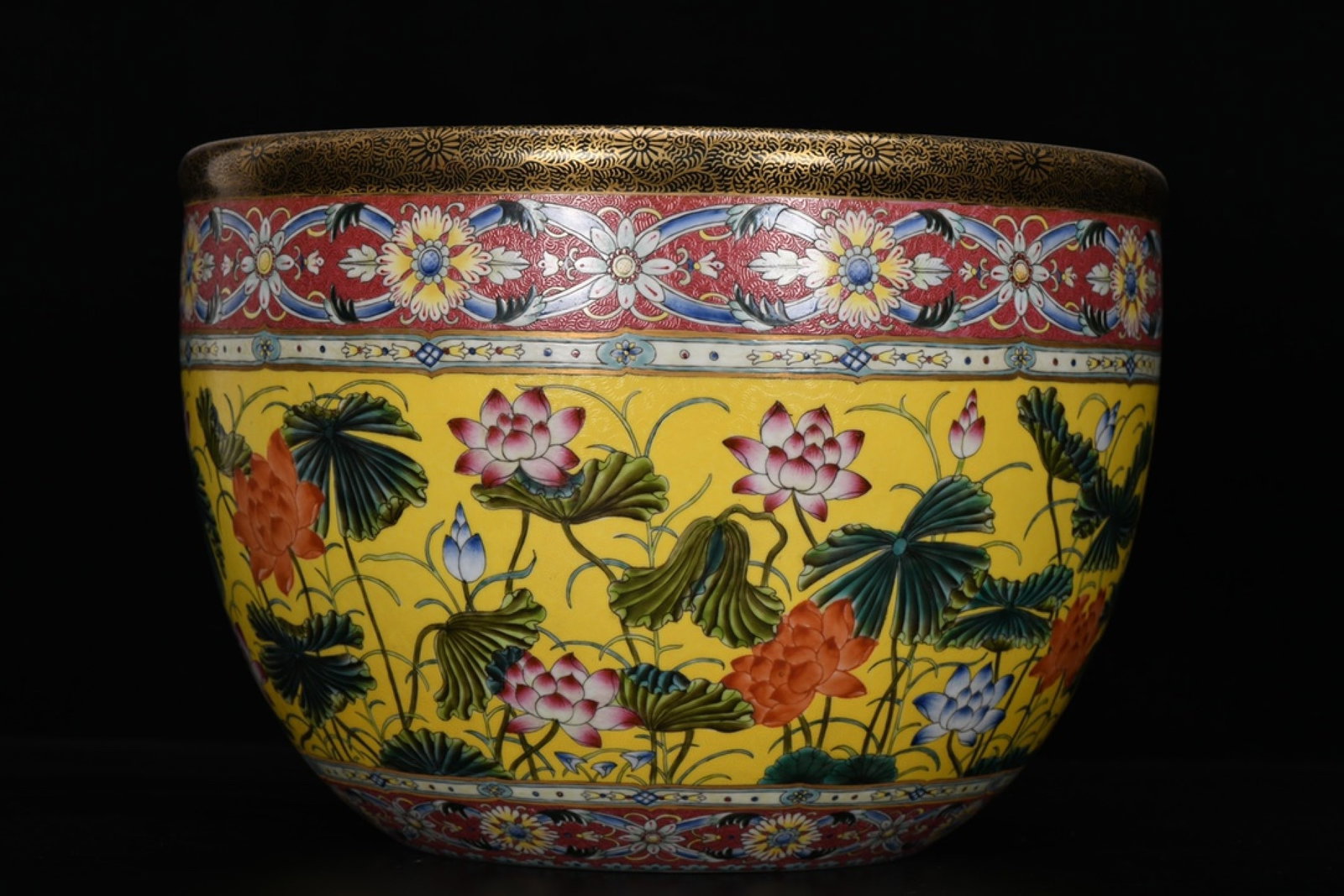 A Rare Yellow Ground Enamel Lotus Pattern Vat: A Rare Yellow Ground Enamel Lotus Pattern Vat,Qing Dynasty,China,Qianlong Four-character Mark,Size:9.6inx13.5in 黄地珐琅彩荷花纹缸,中国