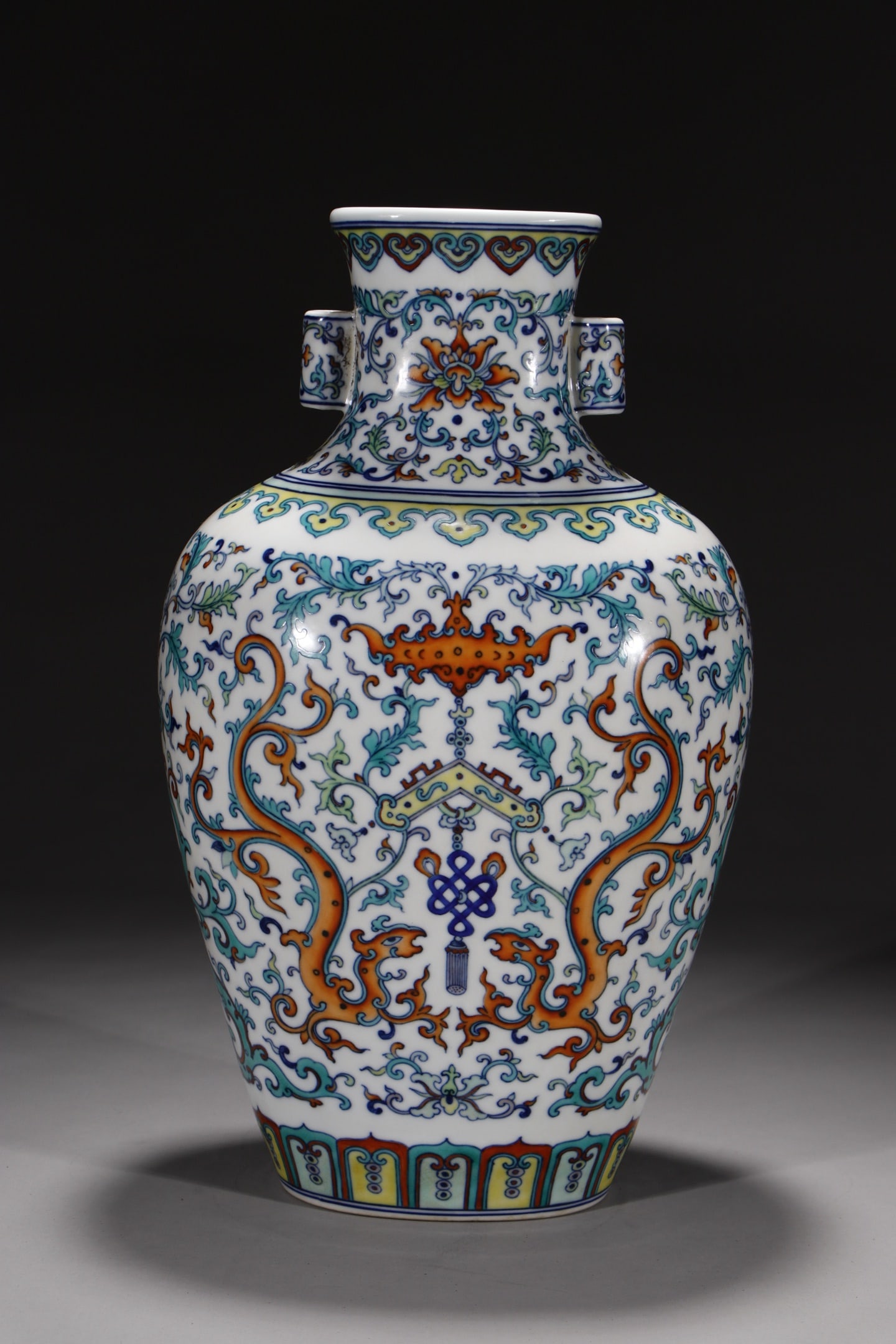 A Rare Doucai Lotus and Dragon Pattern Double-Ears Vase: A Rare Doucai Lotus and Dragon Pattern Double-Ears Vase,Qing Dynasty,China,Qianlong Six-character Mark,Size:14.2in