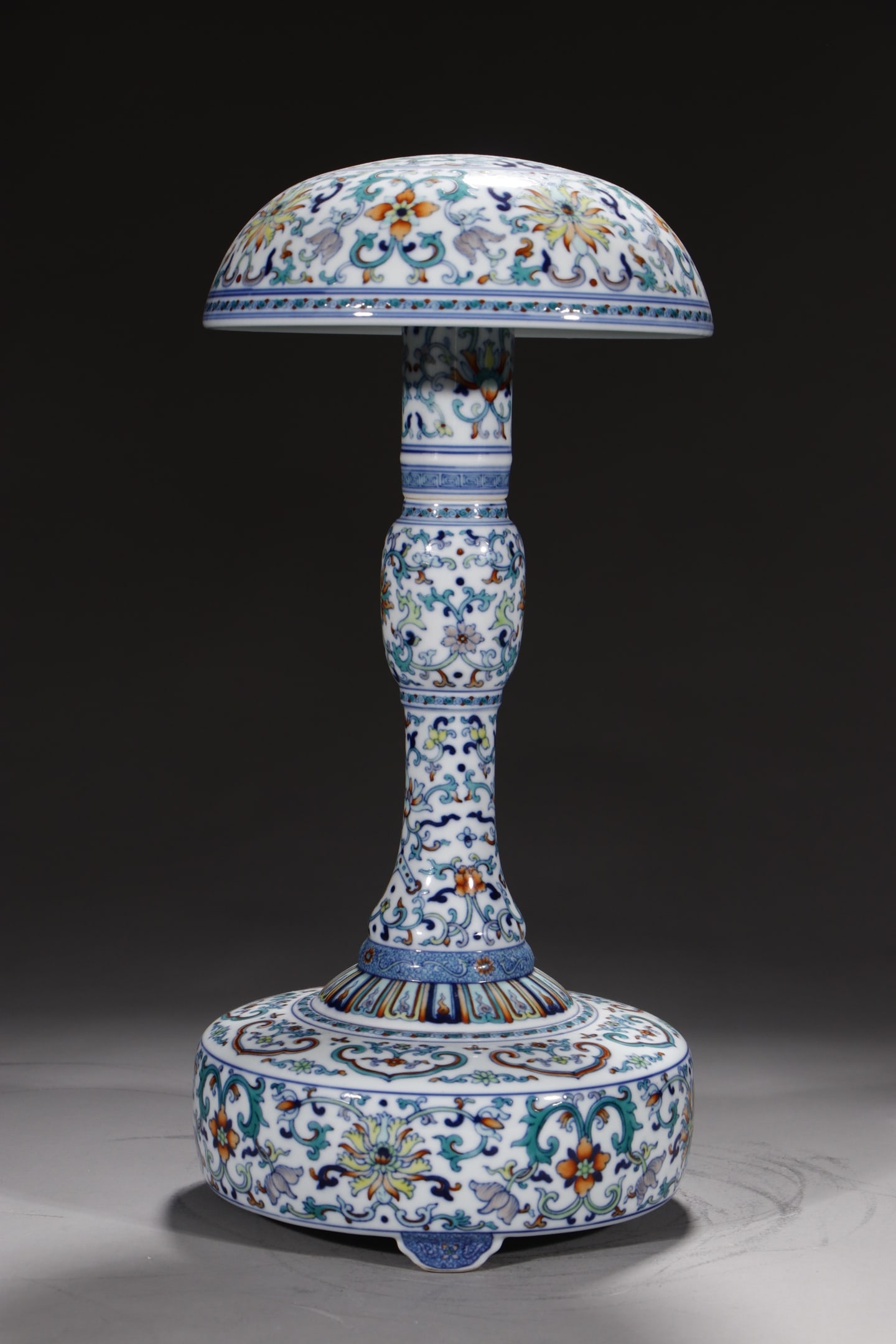A Rare Blue and White Doucai Lotus Pattern Tripod Hatstand: A Rare Blue and White Doucai Lotus Pattern Tripod Hatstand,Qing Dynasty,China,Qianlong Six-character Mark,Size:14.6in