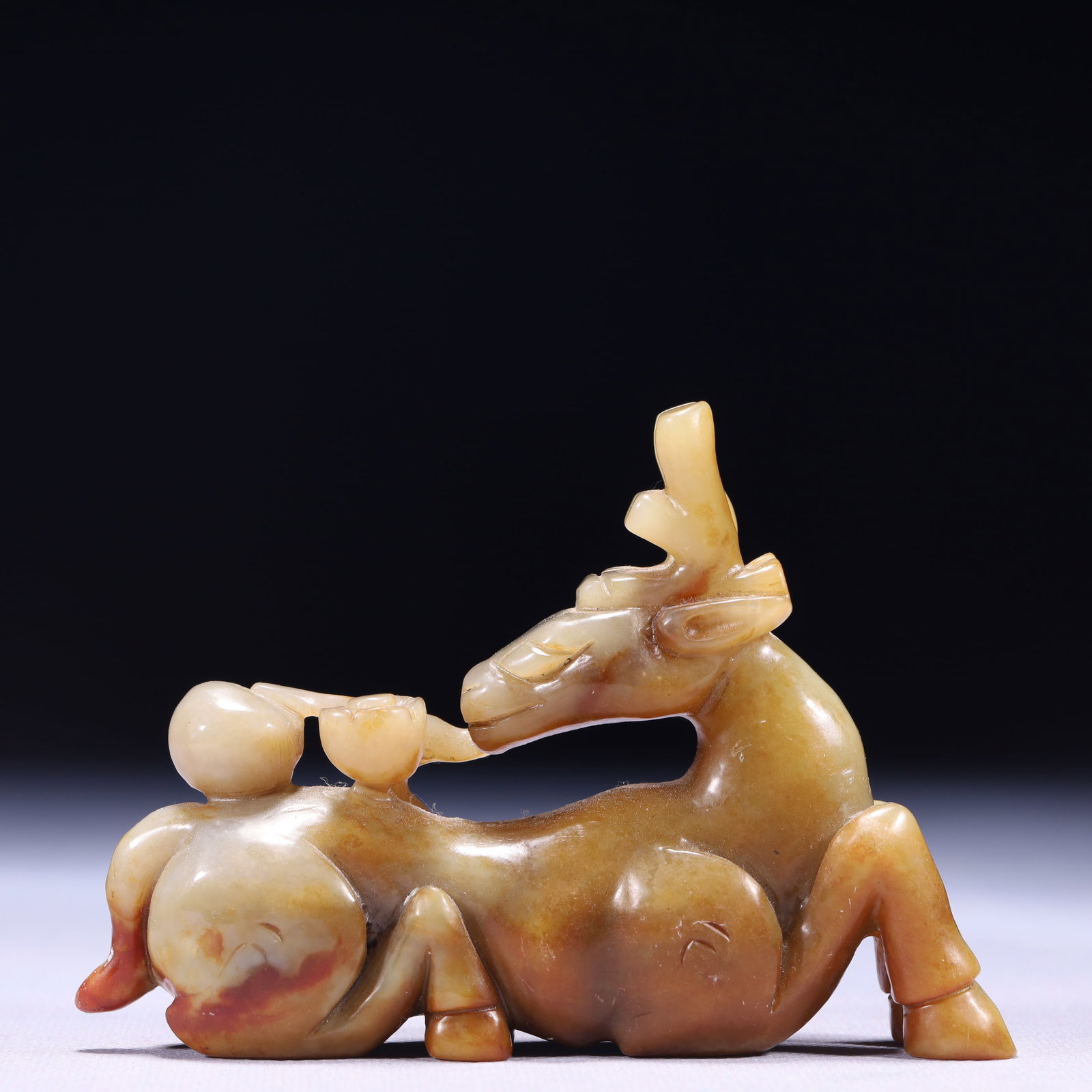 An Exquisite White Jade Deer Ornament: An Exquisite White Jade Deer Ornament,Qing Dynasty,China,Size:4.7inx0.8inx3.5in,Weight:249g 白玉鹿摆件,中国清代