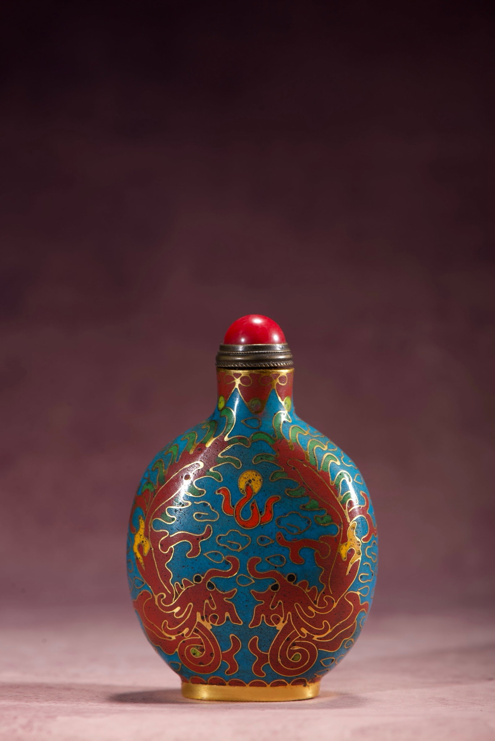 An Exquisite Cloisonne Dragon Pattern Snuff Bottle: An Exquisite Cloisonne Dragon Pattern Snuff Bottle,Qing Dynasty,China,Qianlong Four-character Mark,Size:3.3inx2.2inx1.2in,Weight:73g