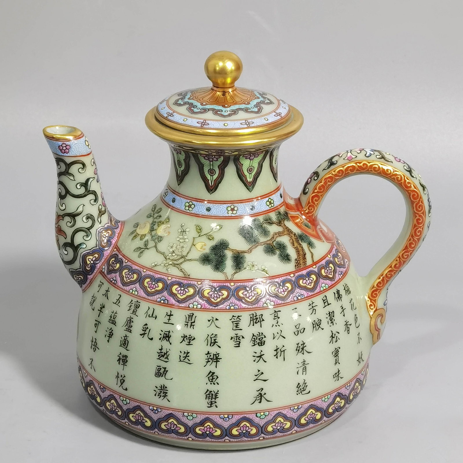 An Exquisite Green Ground Enamel Lotus Pattern Teapot,with poem: An Exquisite Green Ground Enamel Lotus Pattern Teapot,with poem,Qing Dynasty,China,Qianlong Six-character Mark,Size:5.4inx4.5in 绿地珐琅彩缠枝莲纹