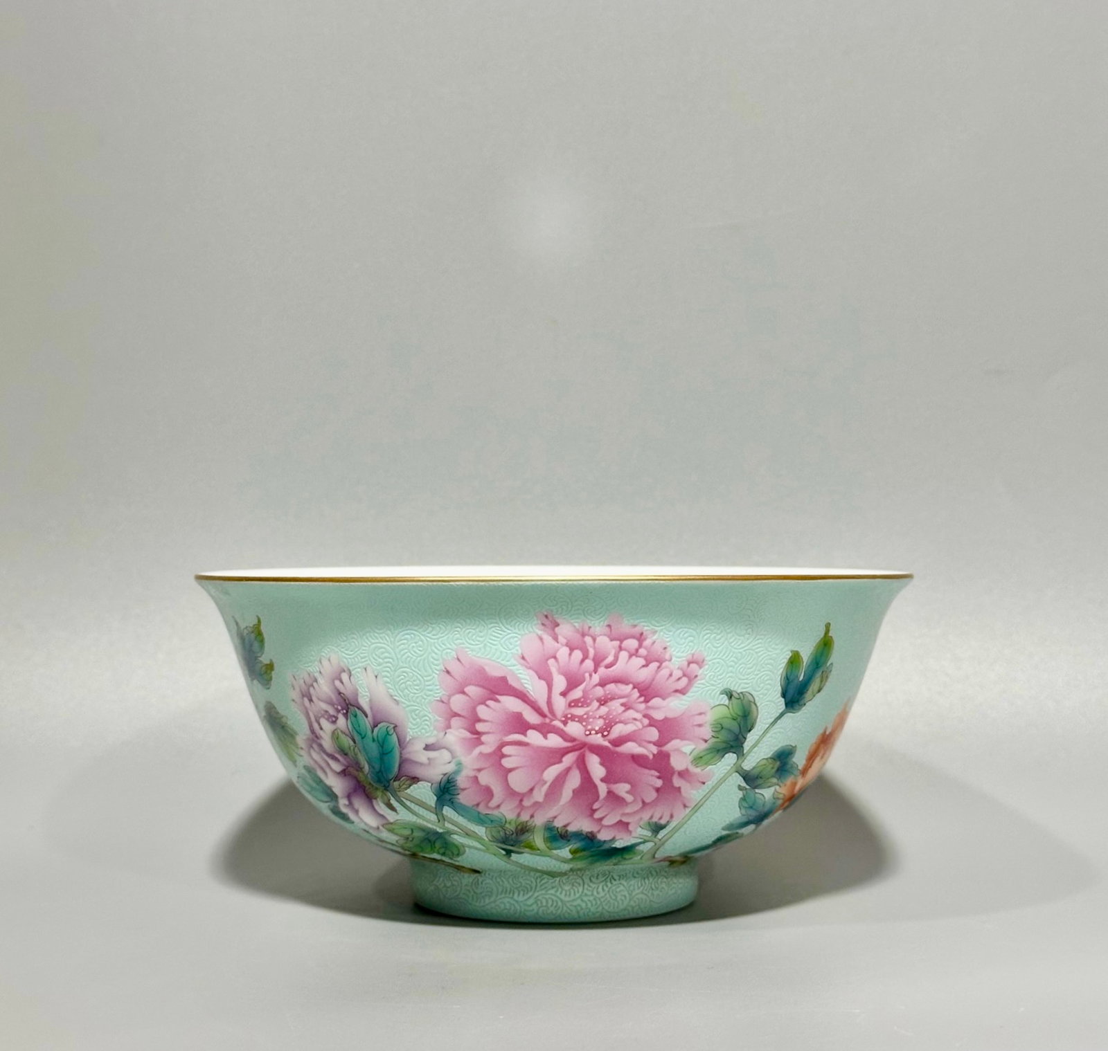 An Exquisite Turquoise Glazed Enamel Flower Pattern Bowl: An Exquisite Turquoise Glazed Enamel Flower Pattern Bowl,Qing Dynasty,China,Qianlong Four-character Mark,Size:2.7inx5.9in 松石绿釉珐琅彩花卉ಬ