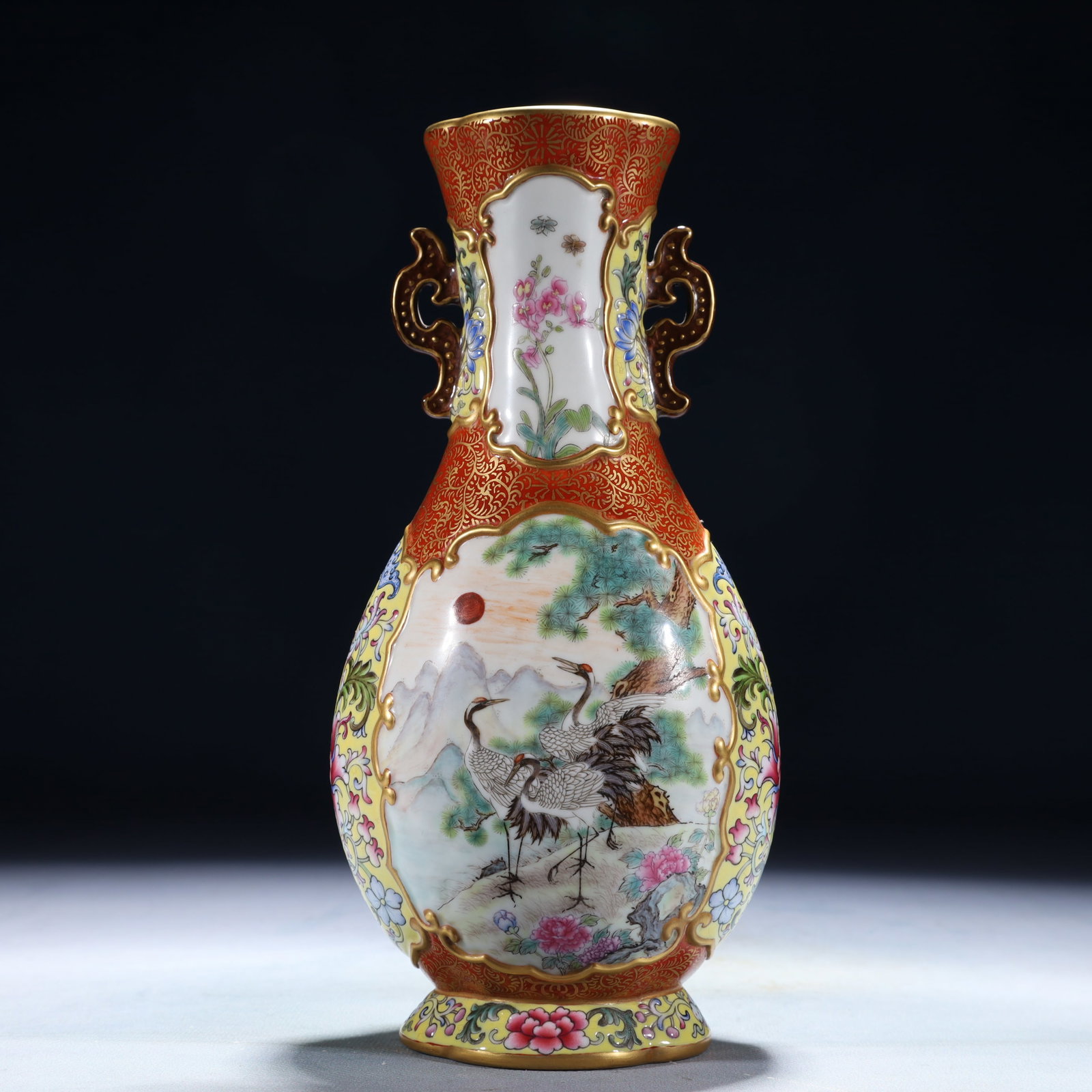 An Exquisite Yellow Ground Famille-Rose Painted Gold Flower and Crane Pattern Double-Ears Vase: An Exquisite Yellow Ground Famille-Rose Painted Gold Flower and Crane Pattern Double-Ears Vase,Qing Dynasty,China,Qianlong Six-character Mark,Size:3.9inx3inx9.1in,Weight:700g 黄地粉&