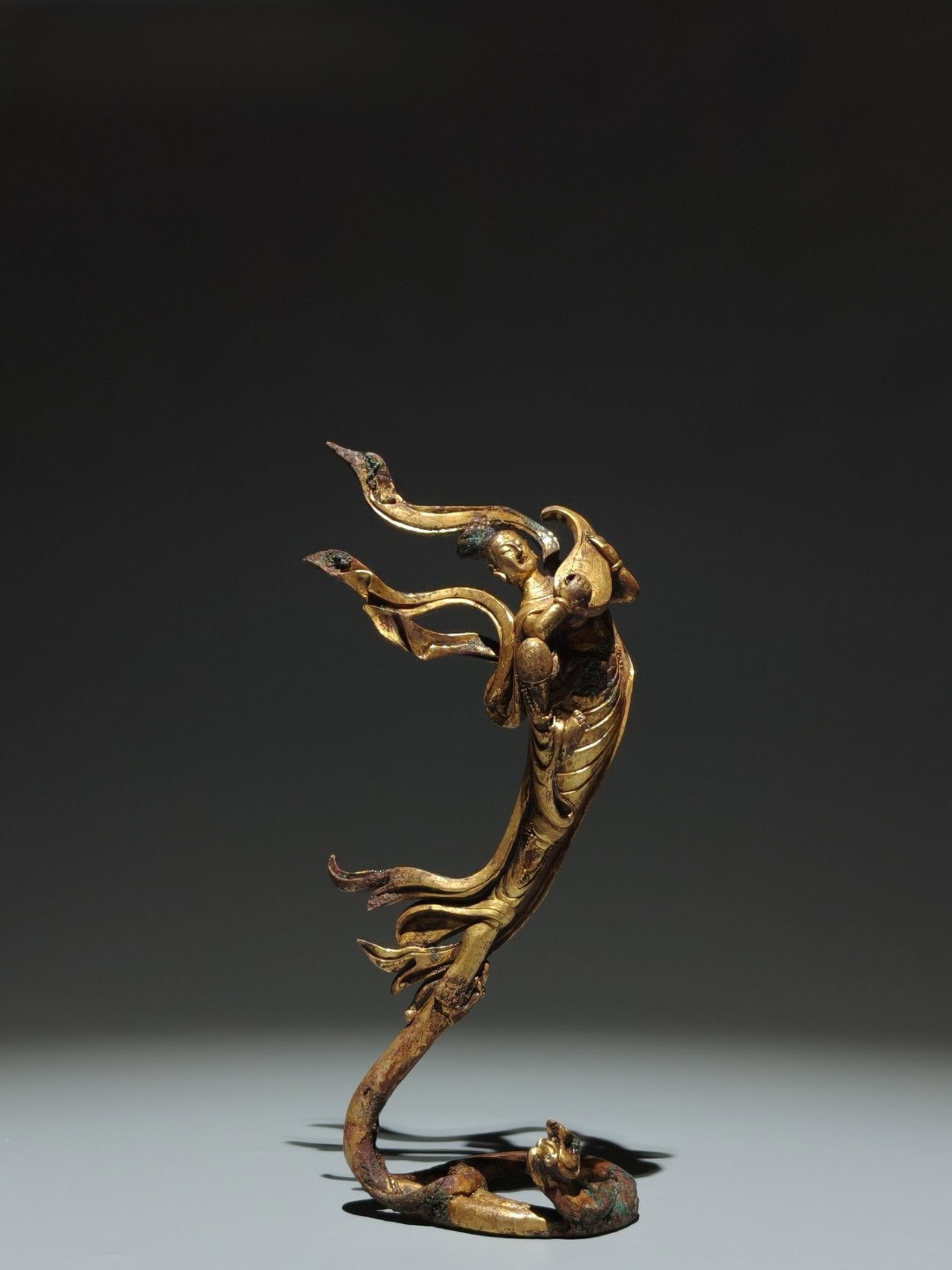 An Exquisite Gilt Bronze Figure Ornament: An Exquisite Gilt Bronze Figure Ornament,Tang Dynasty,China,Size:8.3inx3.7inx2.6in 铜鎏金人物摆件,中国唐代