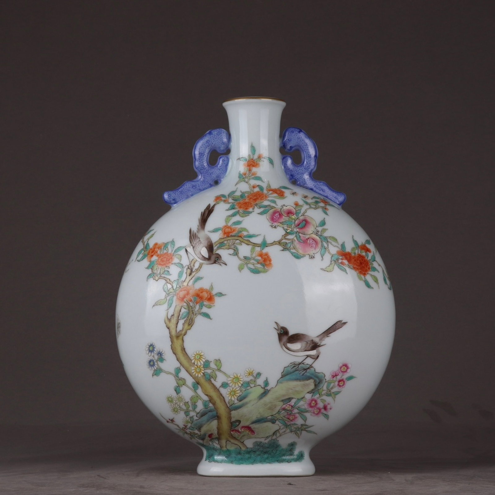 An Exquisite Famille-Rose Flower and Bird Pattern Double-Ears Vase: An Exquisite Famille-Rose Flower and Bird Pattern Double-Ears Vase,Qing Dynasty,China,Qianlong Six-character Mark,Size:10.4inx7.7in 粉彩花鸟纹双耳瓶,